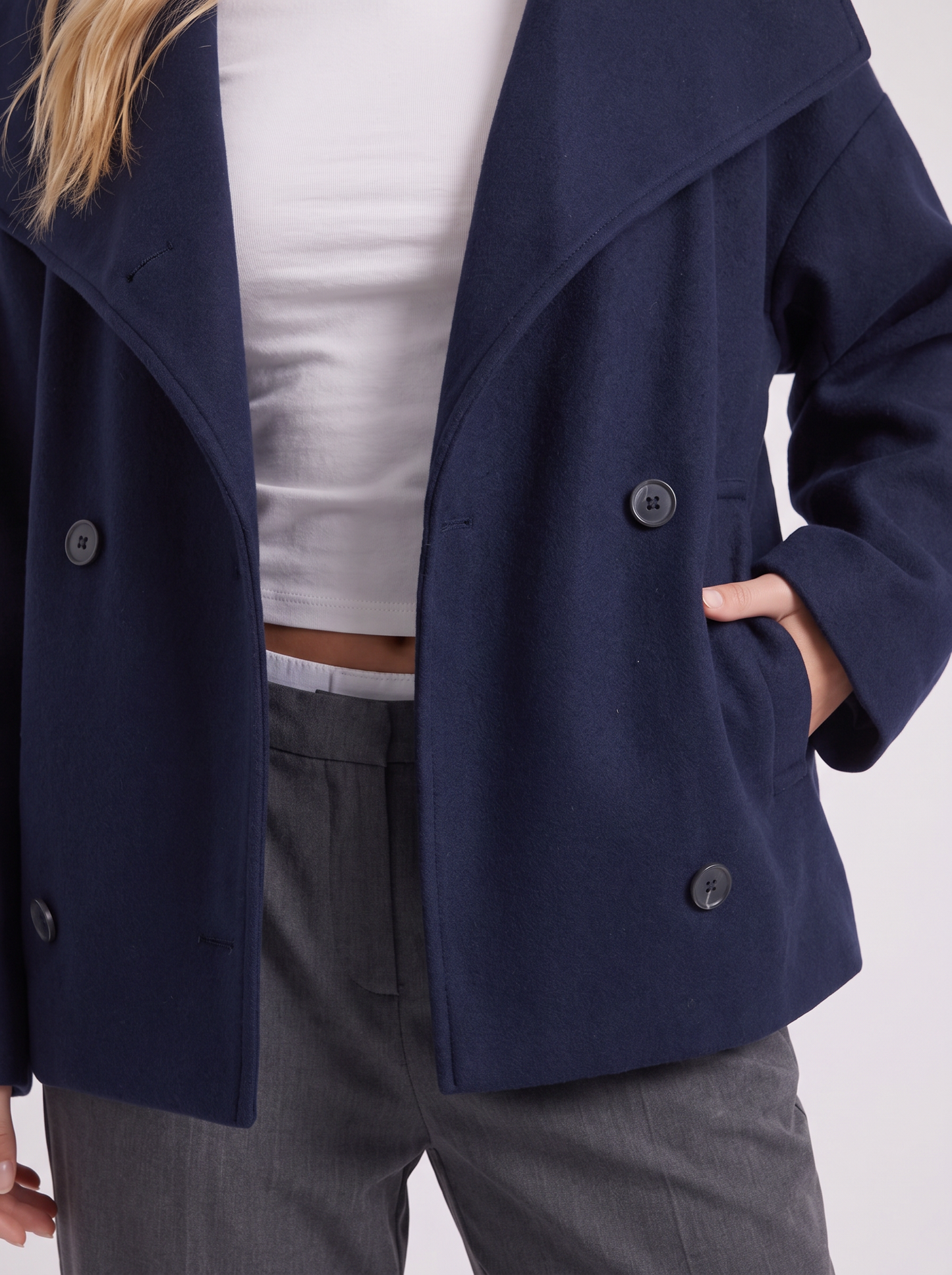 Women navy oversized double breasted wool blend peacoat with wide notch collar, fabric closeup