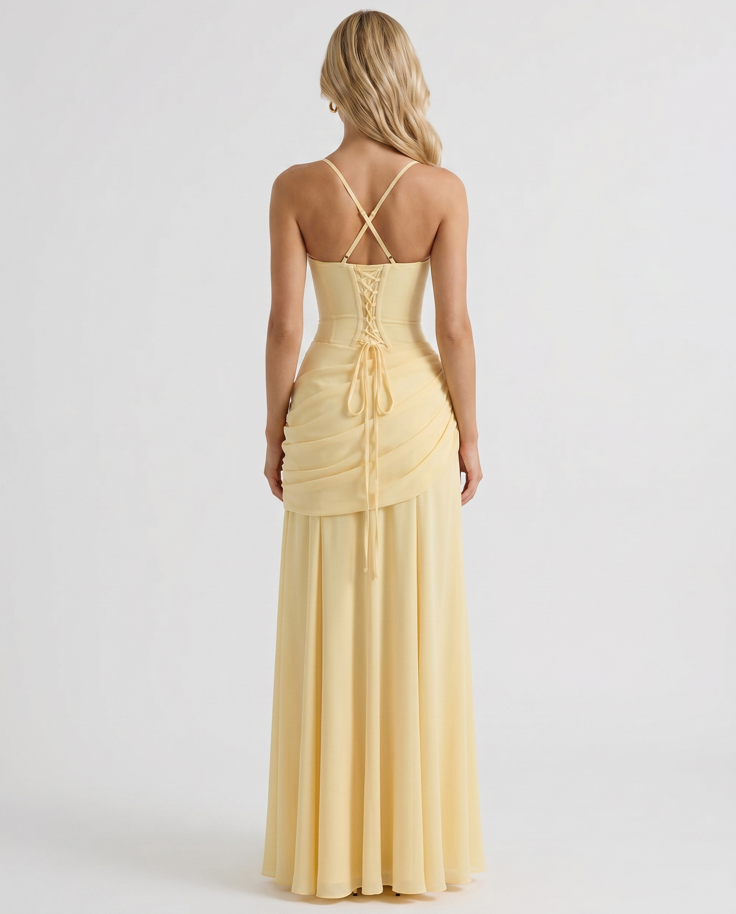 Women yellow ruched maxi dress with fitted back bodice and flowing maxi skirt, back view