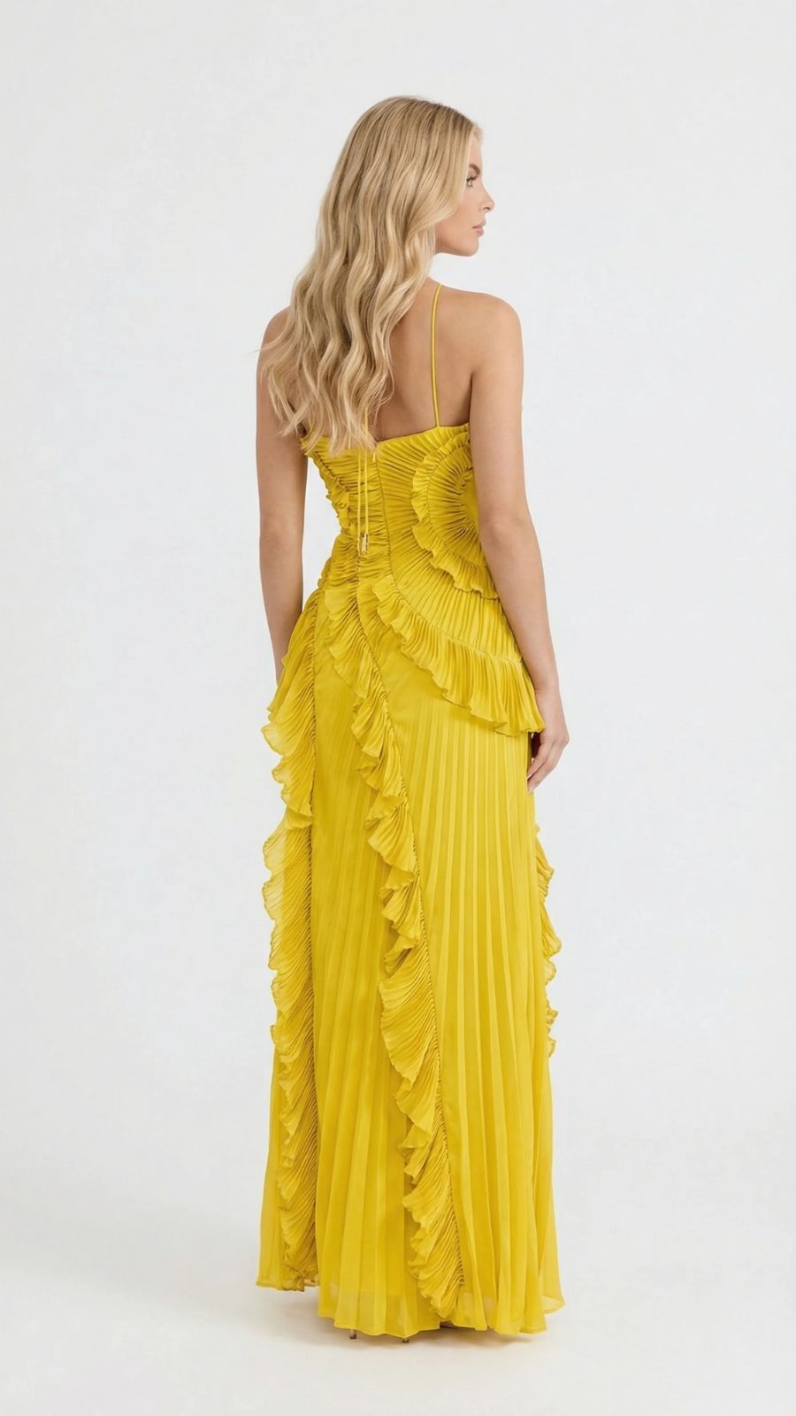 Women's yellow ruffle maxi dress, back view showing lace-up detail and full pleated skirt with ruffles