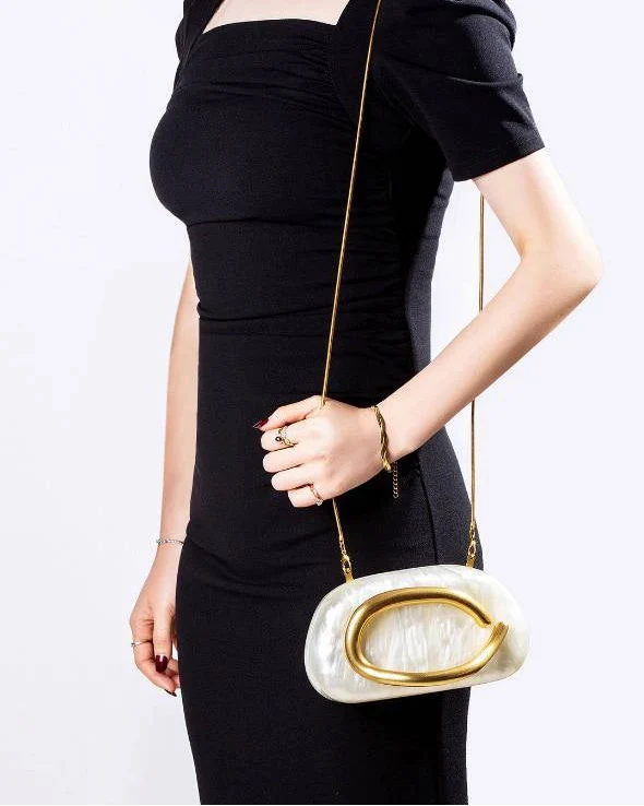 Women ivory clutch bag with chain strap and marbled acrylic