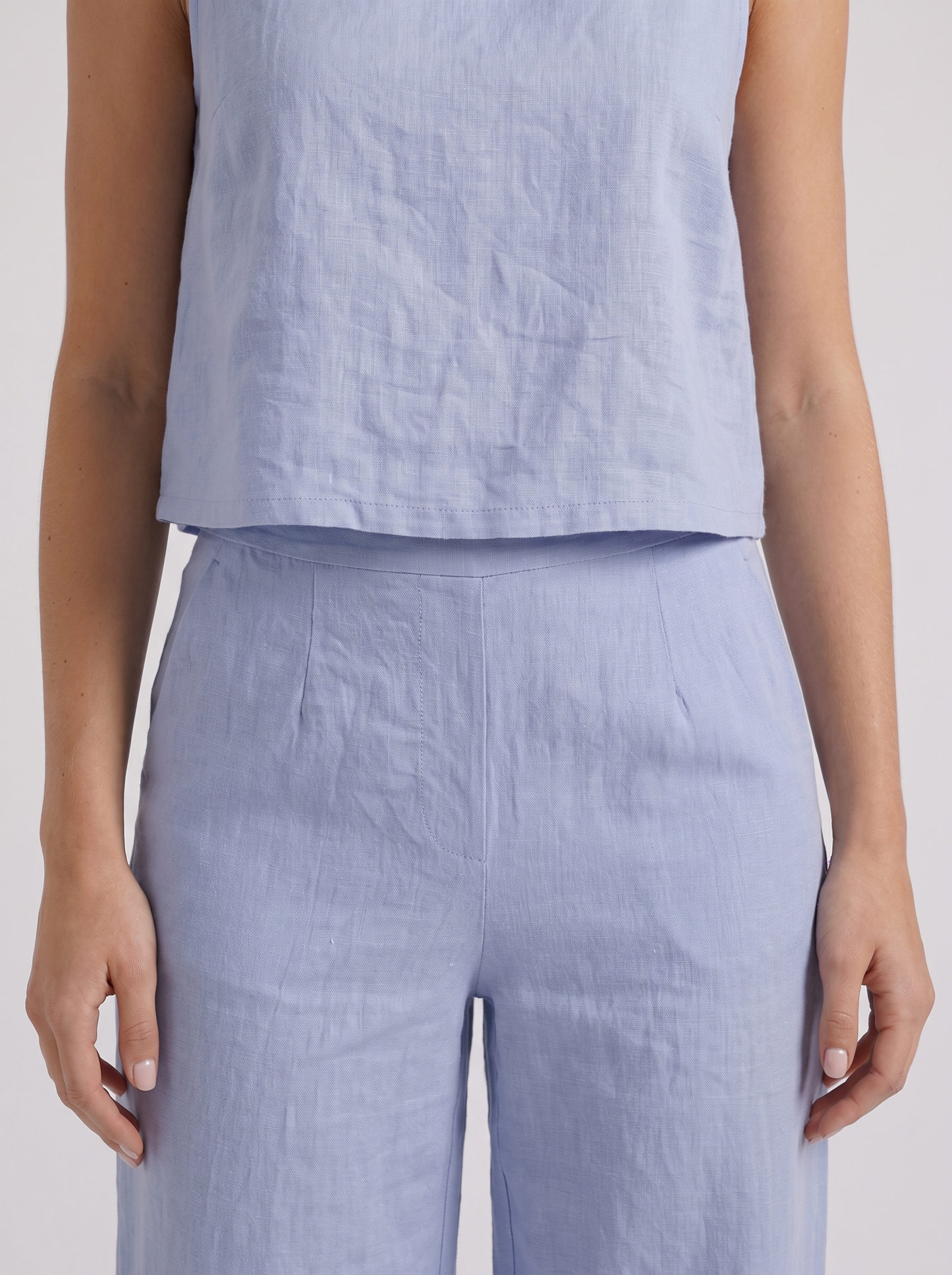 Women blue pants set with sleeveless linen top and round neckline
