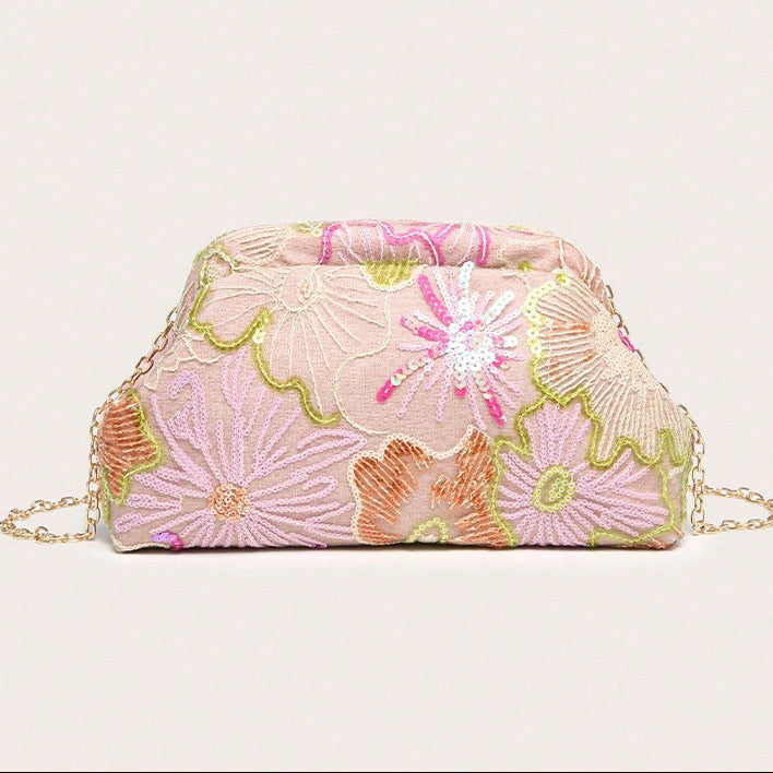 Women pink clutch bag with embroidered detail and sequin finish