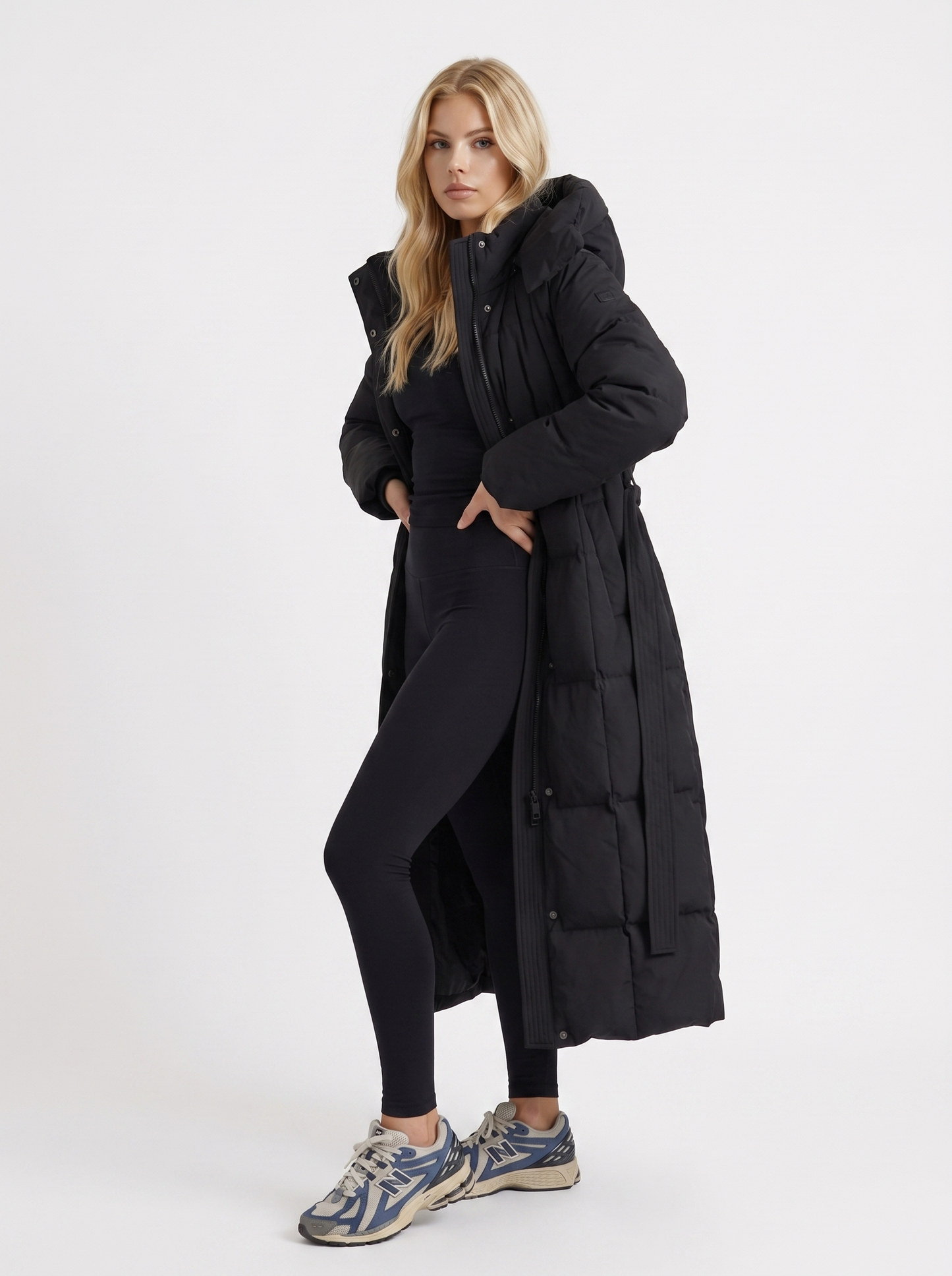 Women black coat with vertical quilting and hooded design