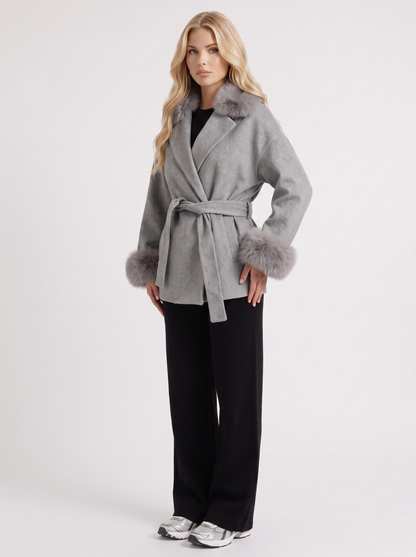Women gray wool blend wrap jacket with shawl collar, tie belt and faux fur cuffs, three quarter view