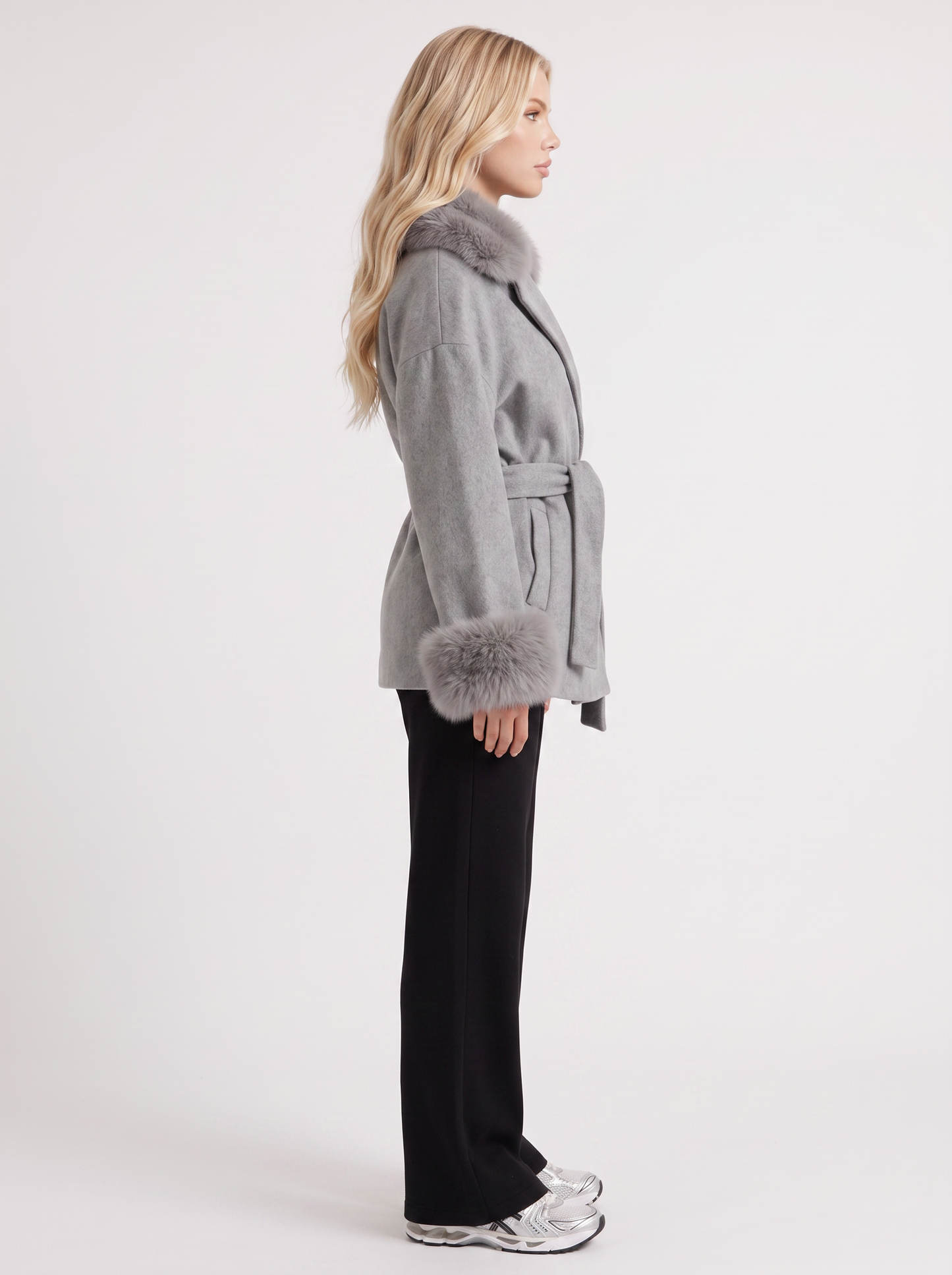 Women gray wool blend wrap jacket with shawl collar, tie belt and faux fur cuffs, side view