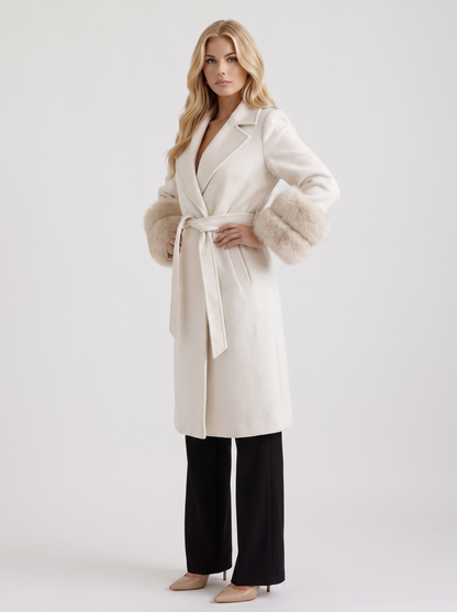 Women white wool blend wrap jacket with shawl collar, tie belt and faux fur cuffs, three quarter view