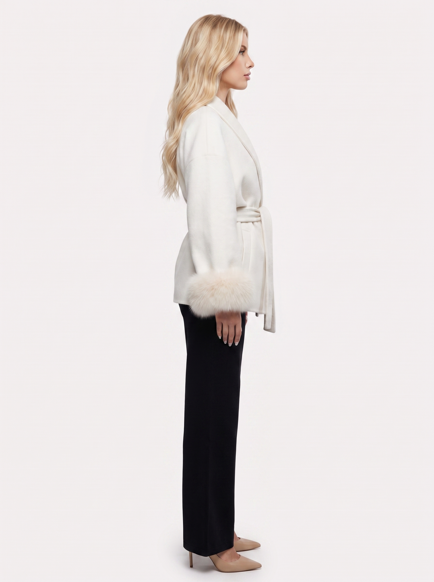 Women white wool blend wrap jacket with shawl collar, tie belt and faux fur cuffs, side view