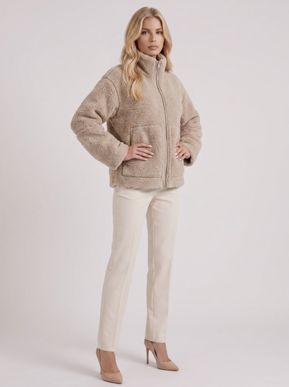 Women beige oversized teddy borg jacket with stand collar and two way zip, three quarter view