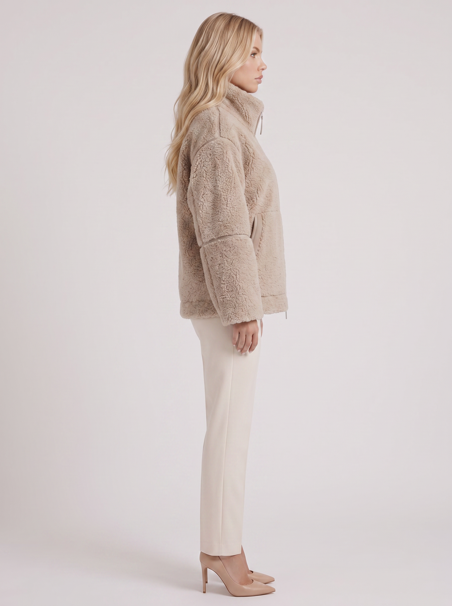 Women beige oversized teddy borg jacket with stand collar and two way zip, side view