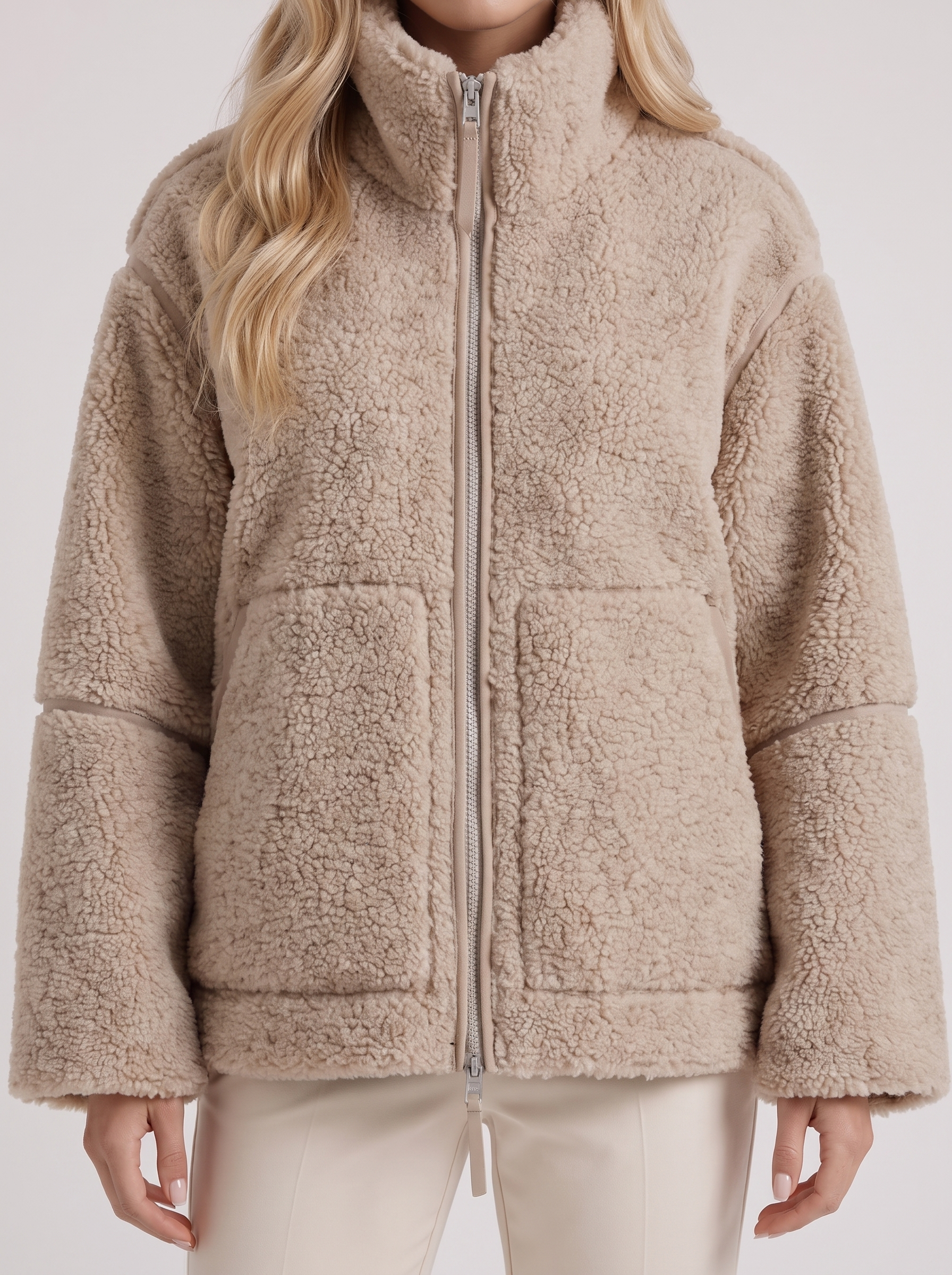 Women beige oversized teddy borg jacket with stand collar and two way zip, fabric closeup
