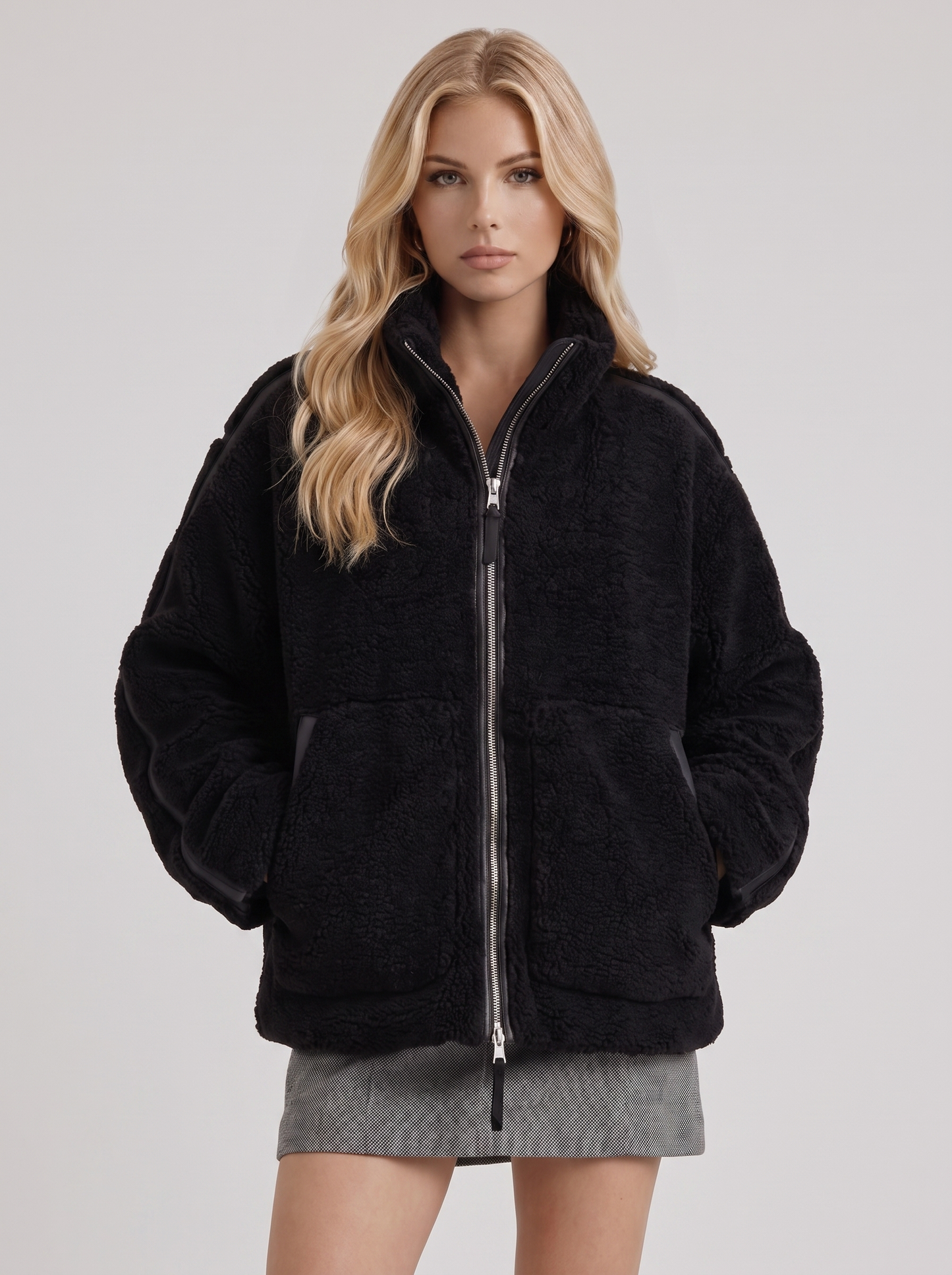 Women black oversized teddy borg jacket with stand collar and two way zip, front detail