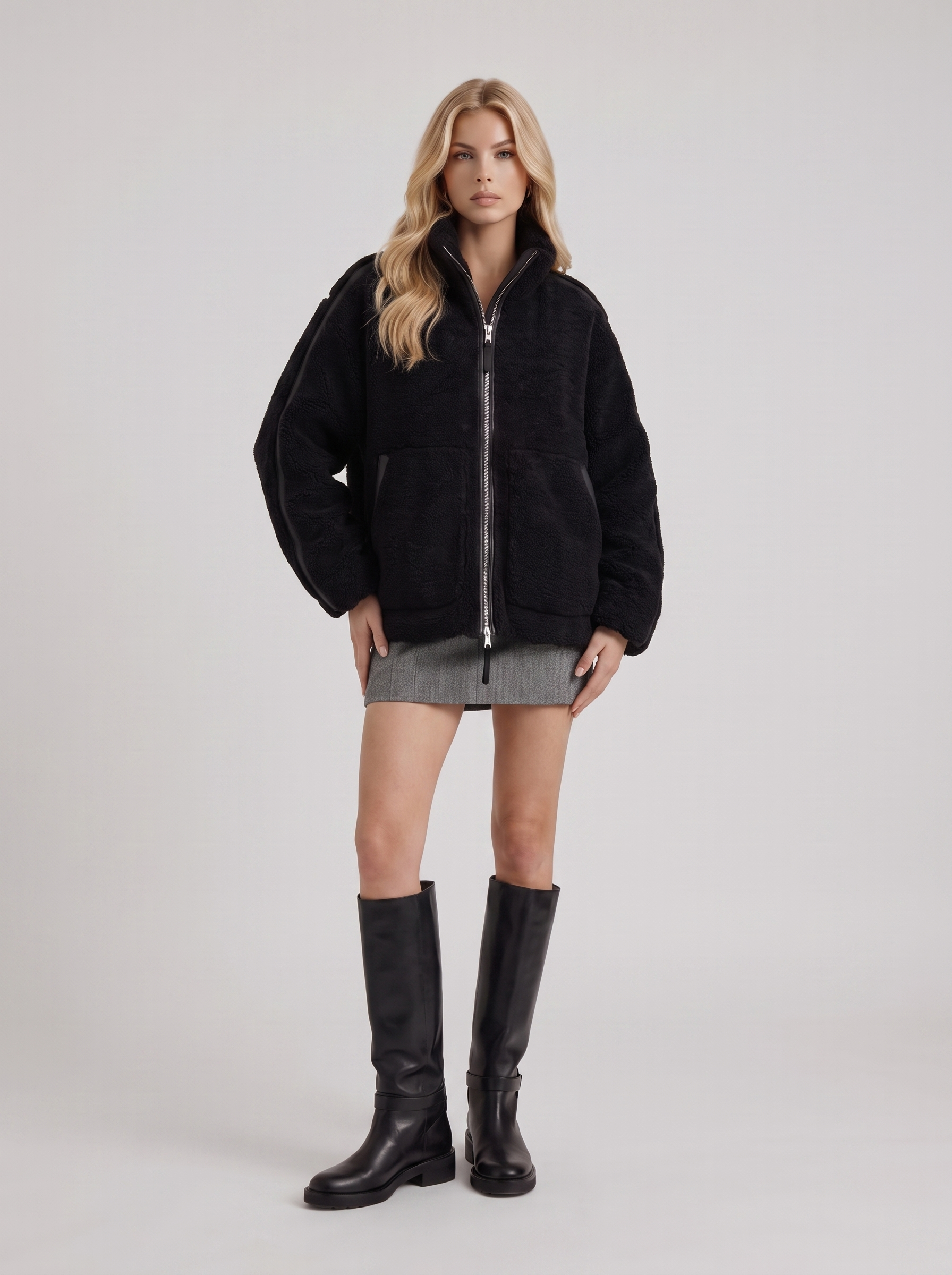 Women black oversized teddy borg jacket with stand collar and two way zip, three quarter view