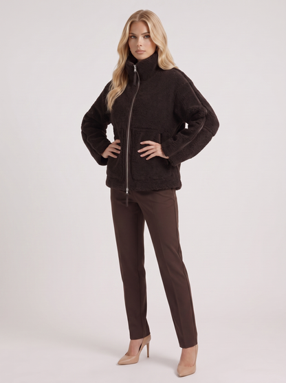 Women chocolate oversized teddy borg jacket with stand collar and two way zip, three quarter view