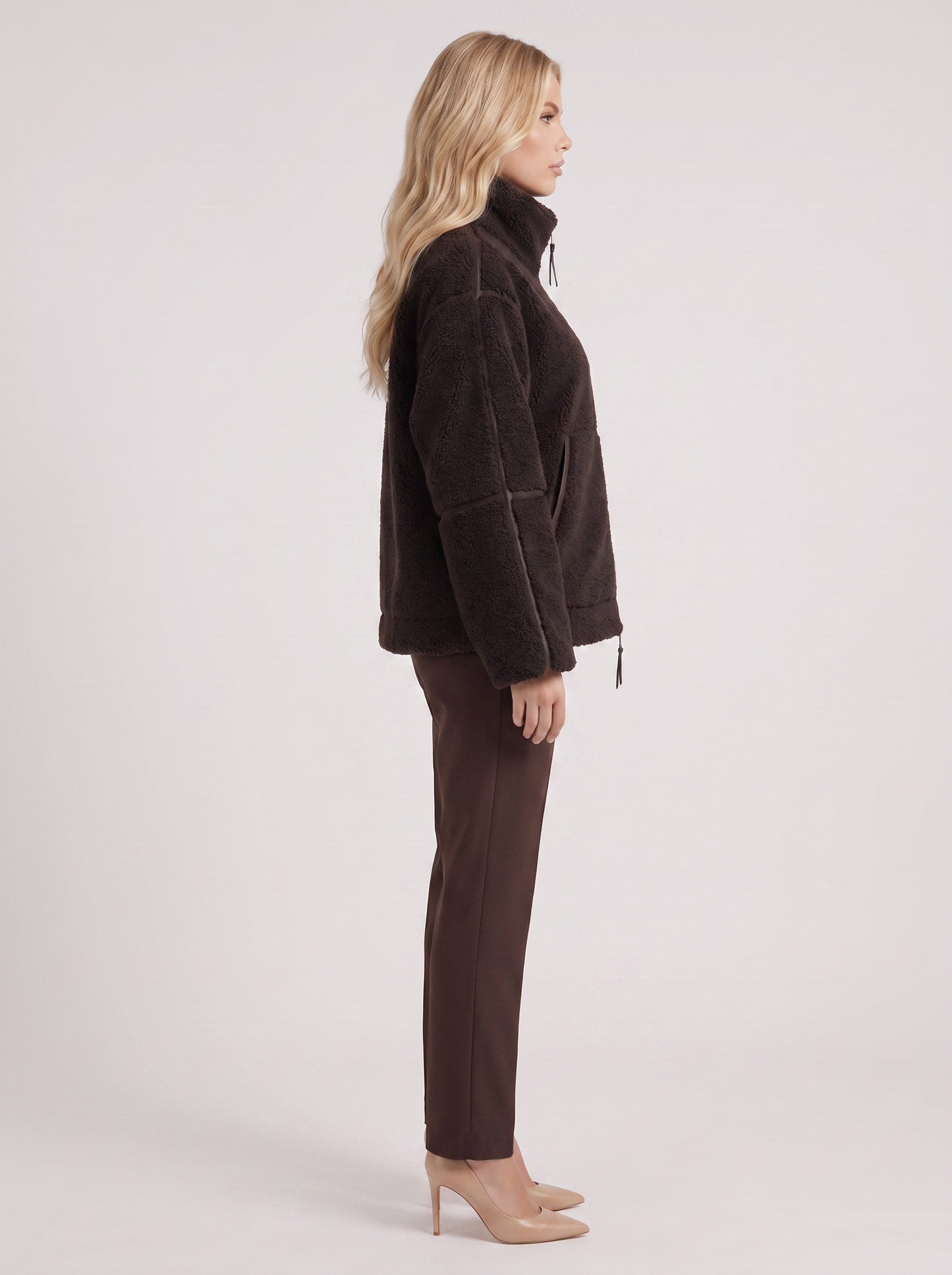 Women chocolate oversized teddy borg jacket with stand collar and two way zip, side view