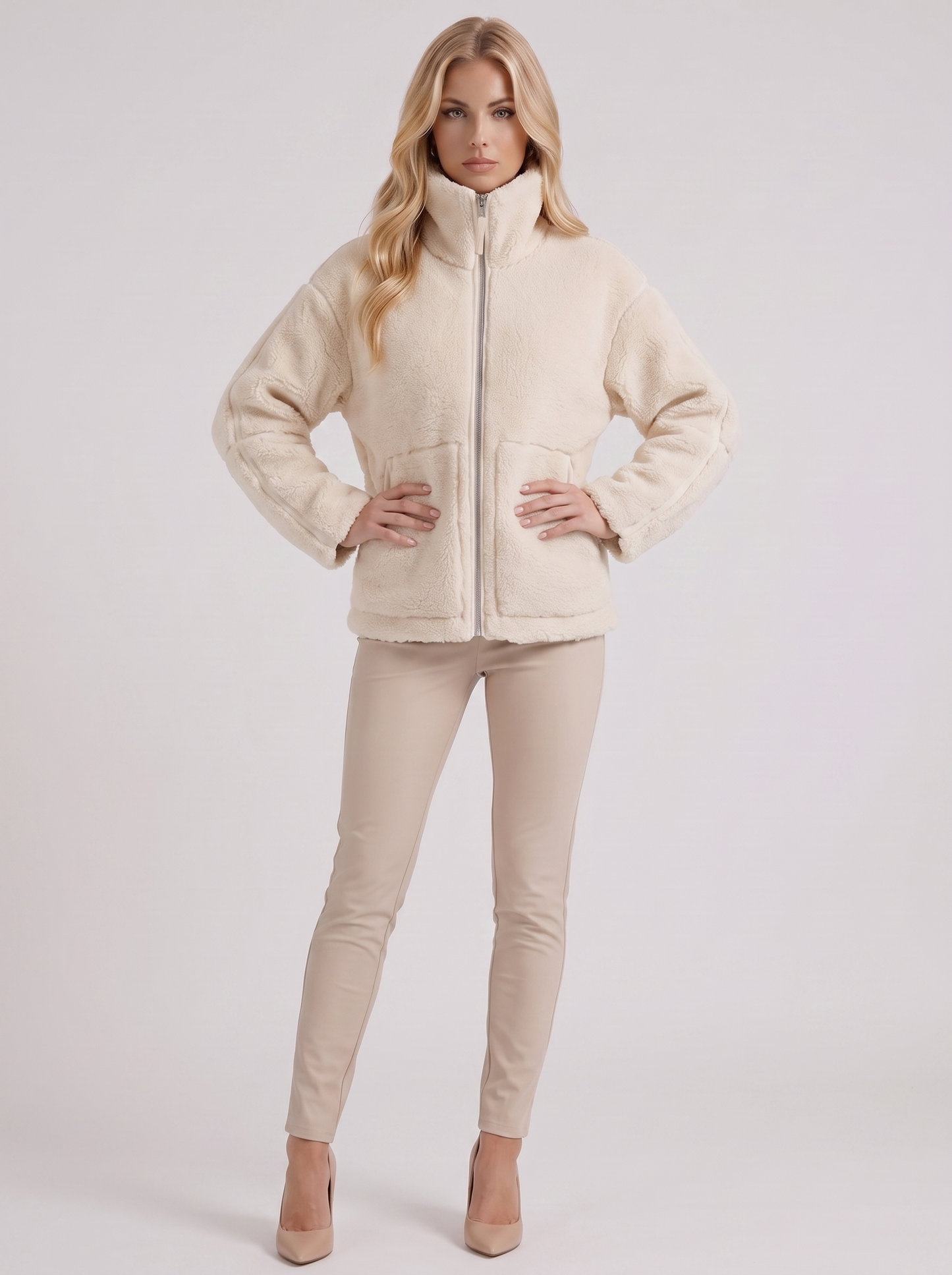 Women white oversized teddy borg jacket with stand collar and two way zip, three quarter view