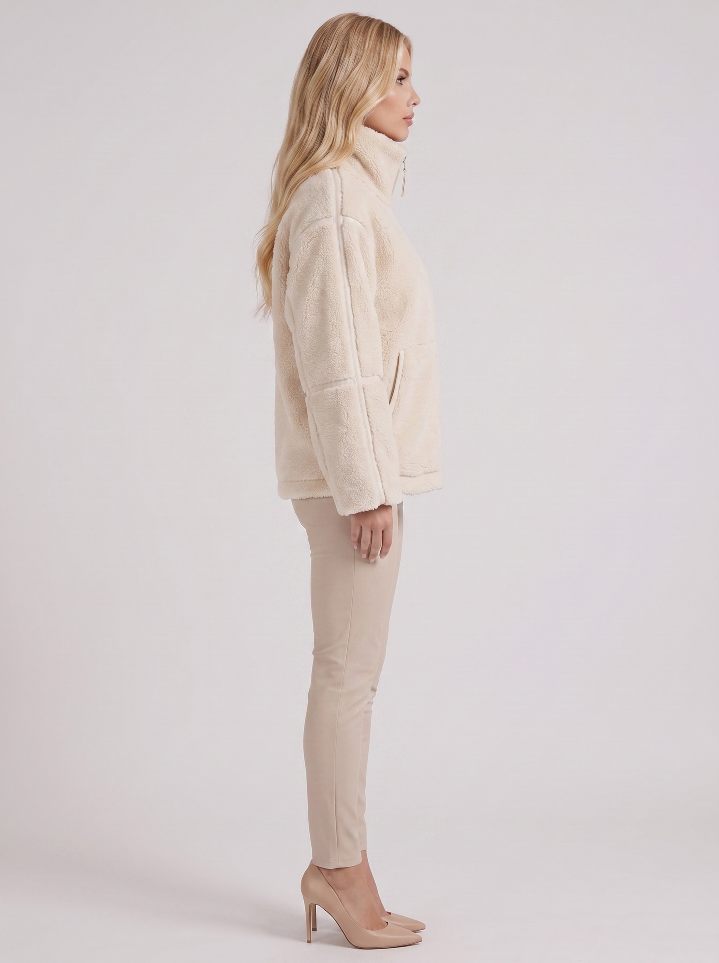 Women white oversized teddy borg jacket with stand collar and two way zip, side view