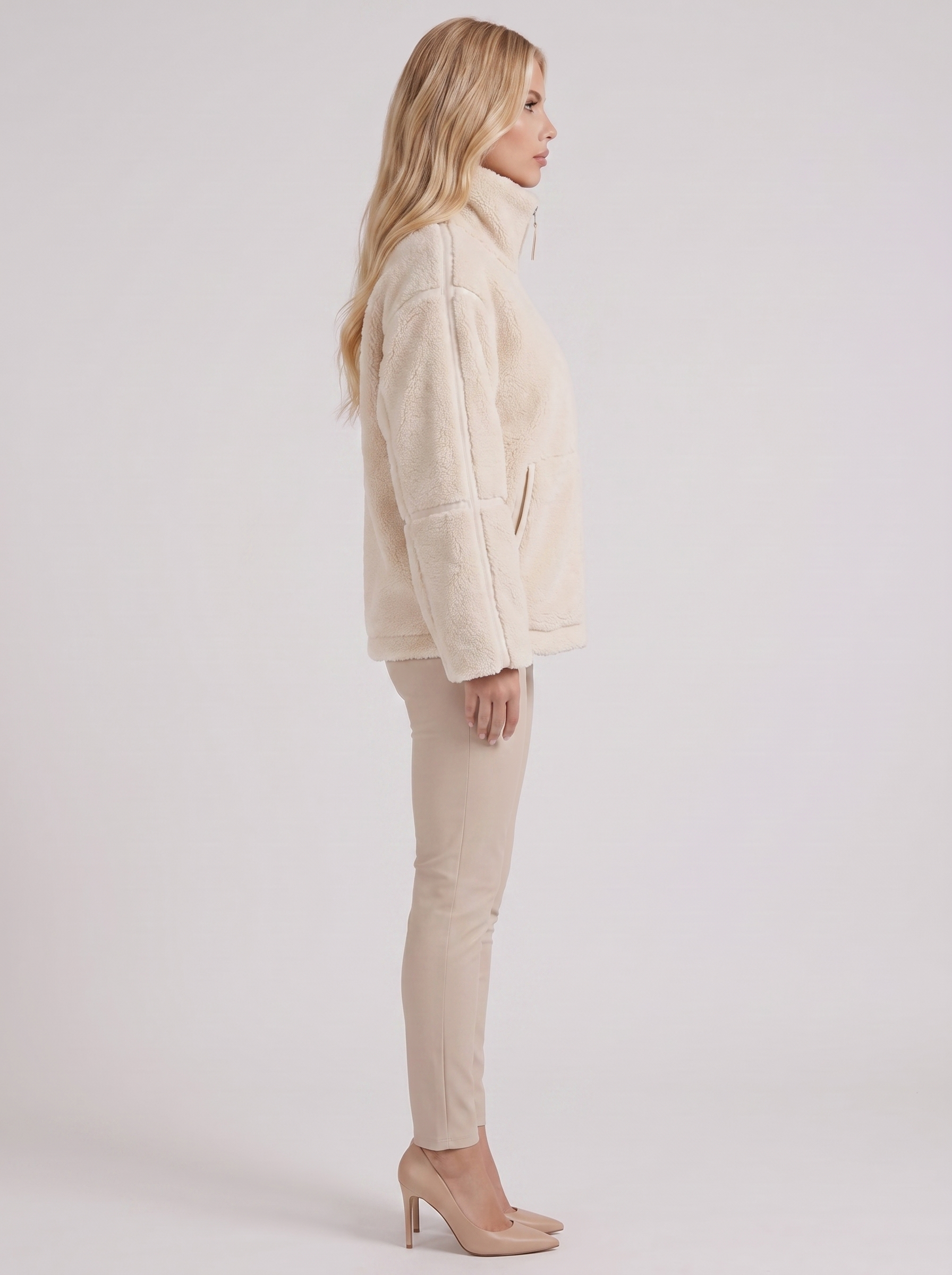 Women white oversized teddy borg jacket with stand collar and two way zip, side view