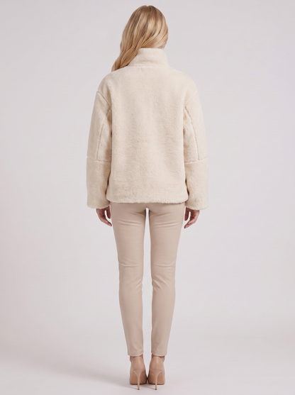 Women white oversized teddy borg jacket with stand collar and two way zip, back view