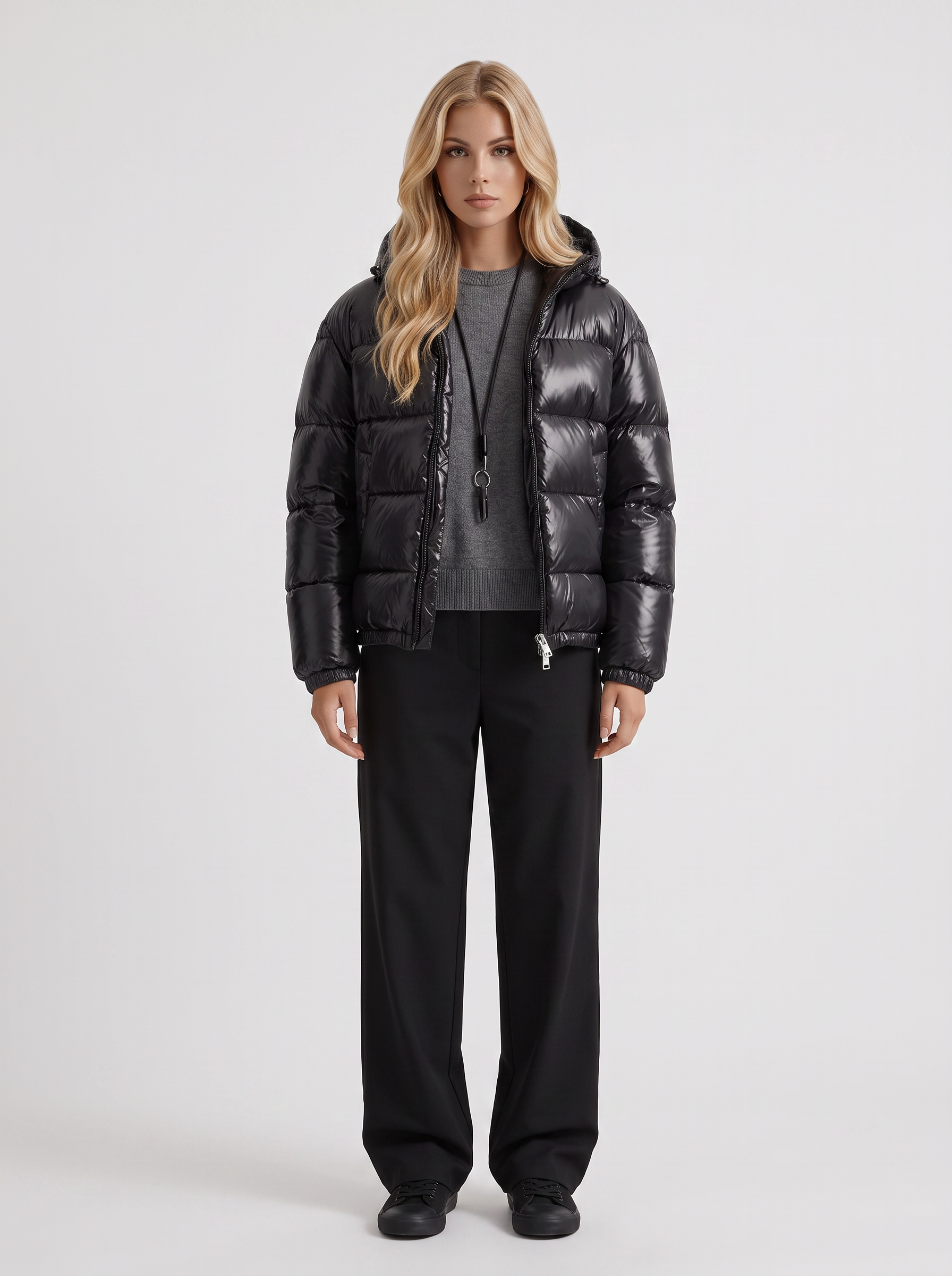 Women black cropped hooded puffer jacket with horizontal quilting and glossy finish, front view