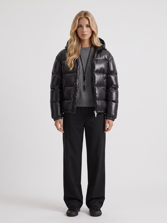 Women black cropped hooded puffer jacket with horizontal quilting and glossy finish, front view