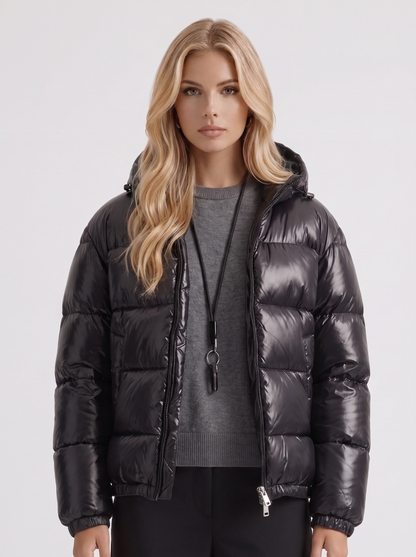 Women black cropped hooded puffer jacket with horizontal quilting and glossy finish, front detail