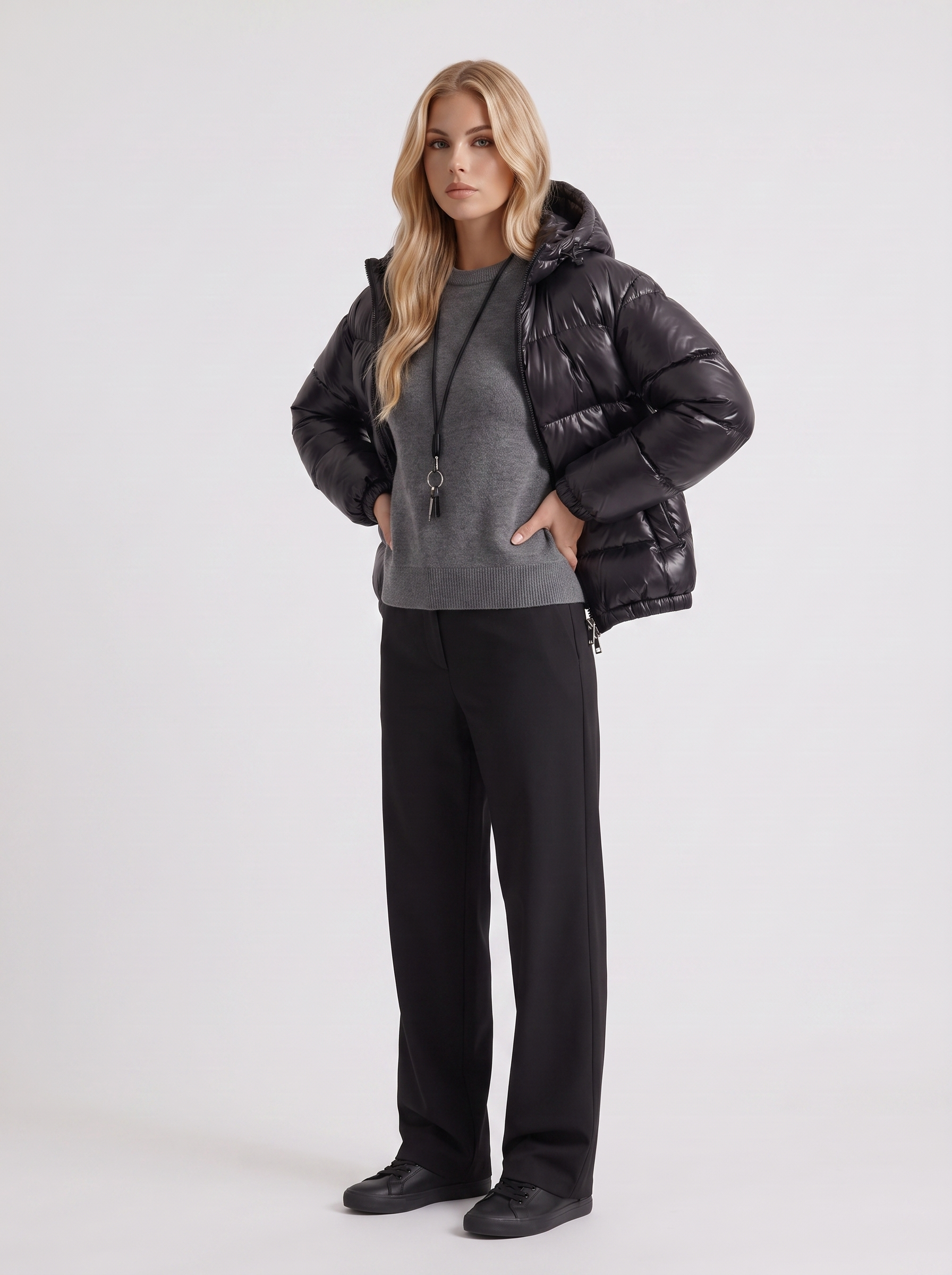 Women black cropped hooded puffer jacket with horizontal quilting and glossy finish, three quarter view