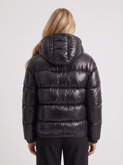 Women black cropped hooded puffer jacket with horizontal quilting and glossy finish, back view