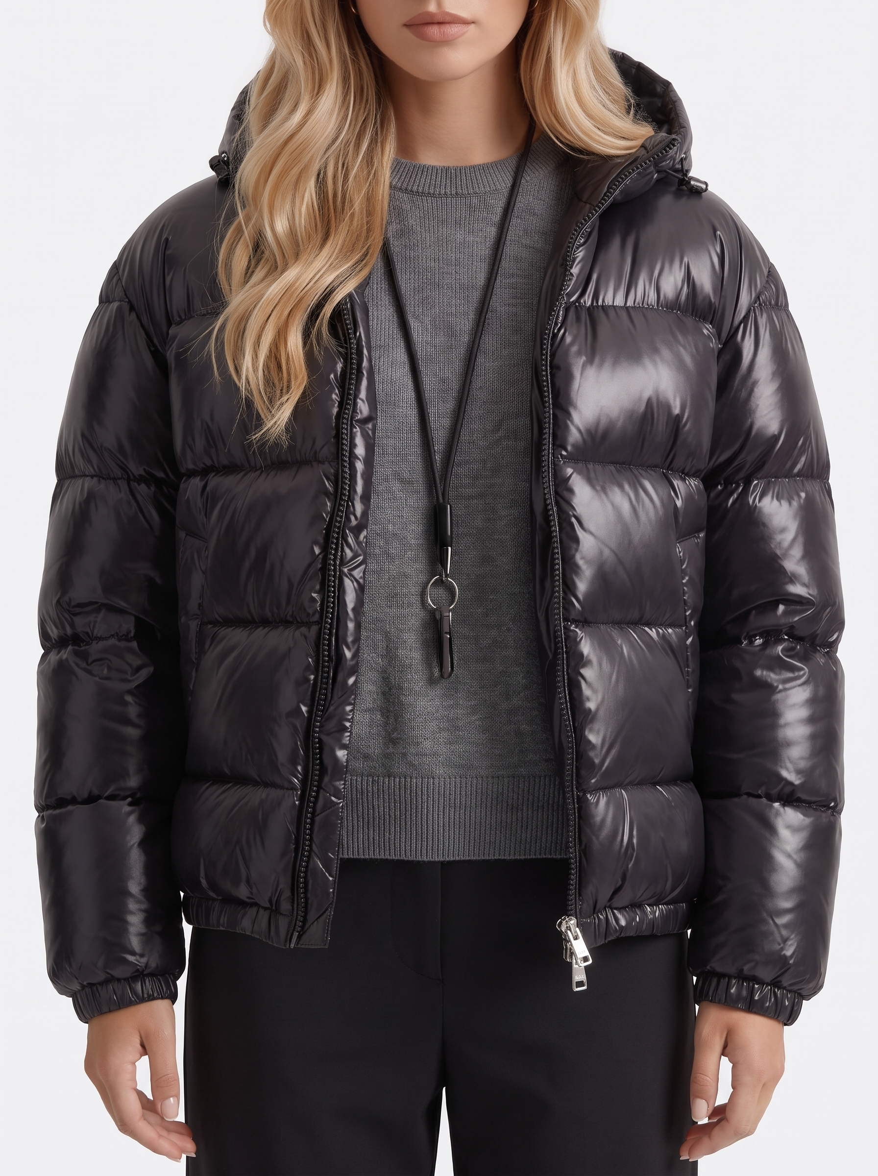 Women black cropped hooded puffer jacket with horizontal quilting and glossy finish, fabric closeup