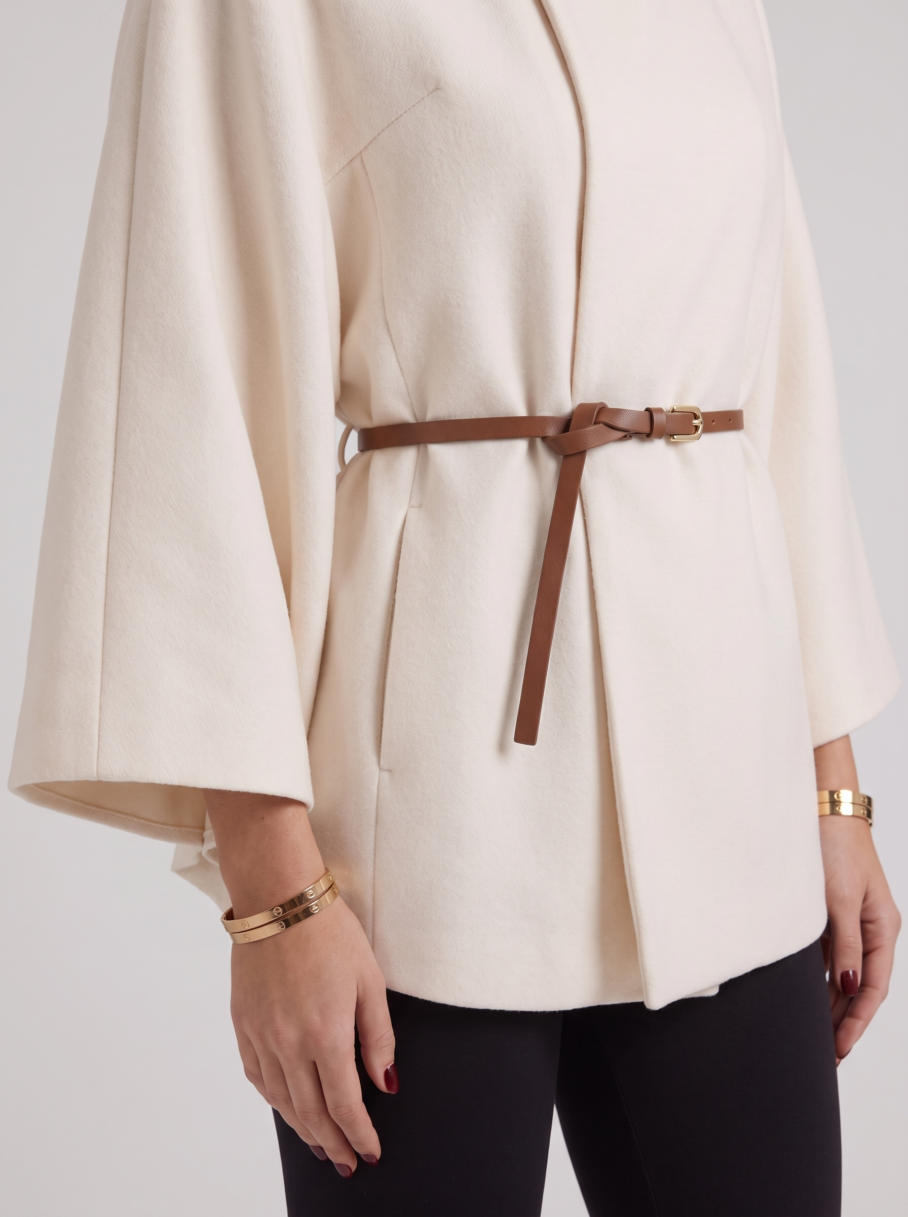 Women cream wool blend cape jacket with funnel neck, button fastening and slim belt, fabric closeup