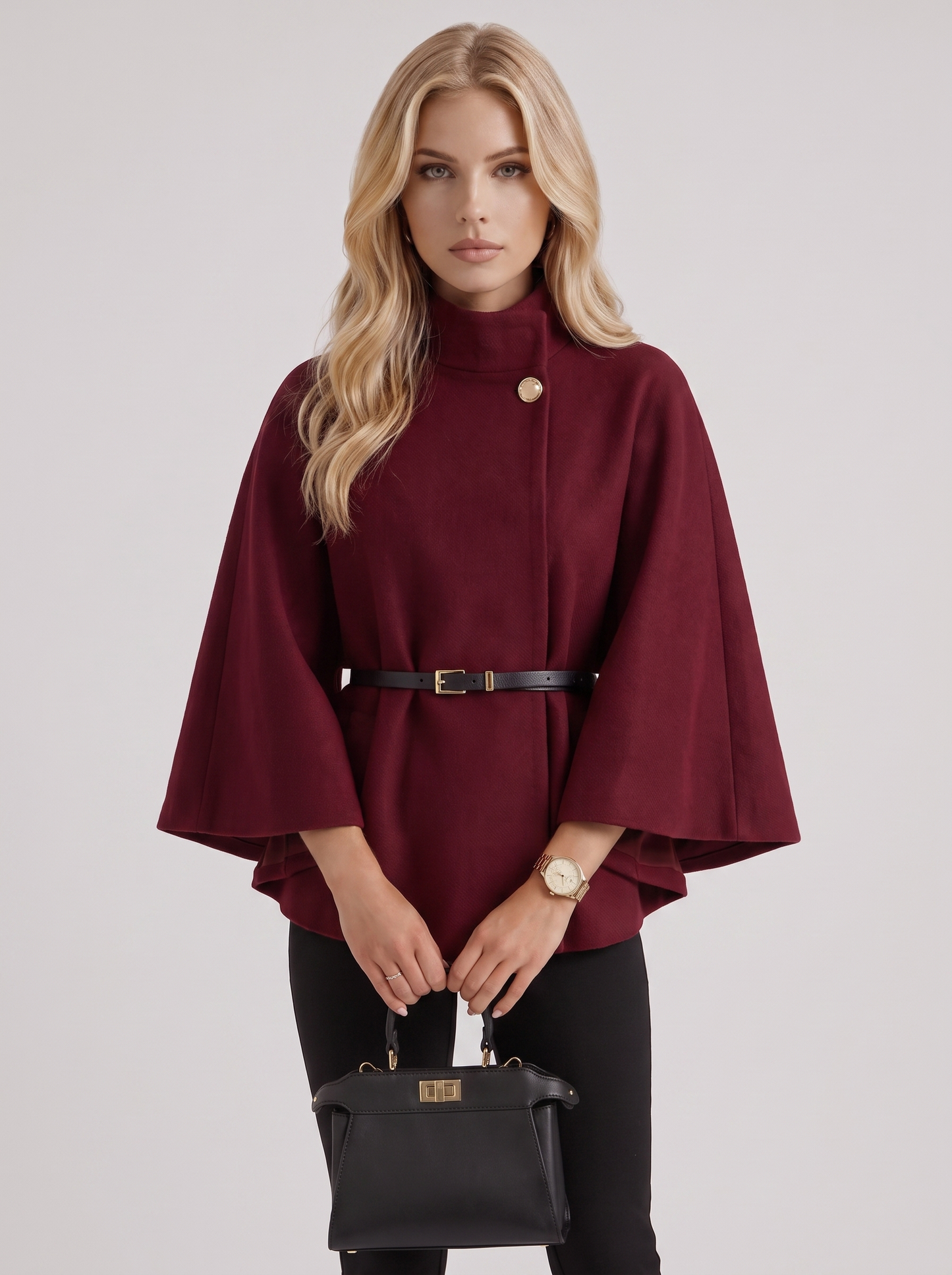 Women burgundy wool blend cape jacket with funnel neck, button fastening and slim belt, front detail