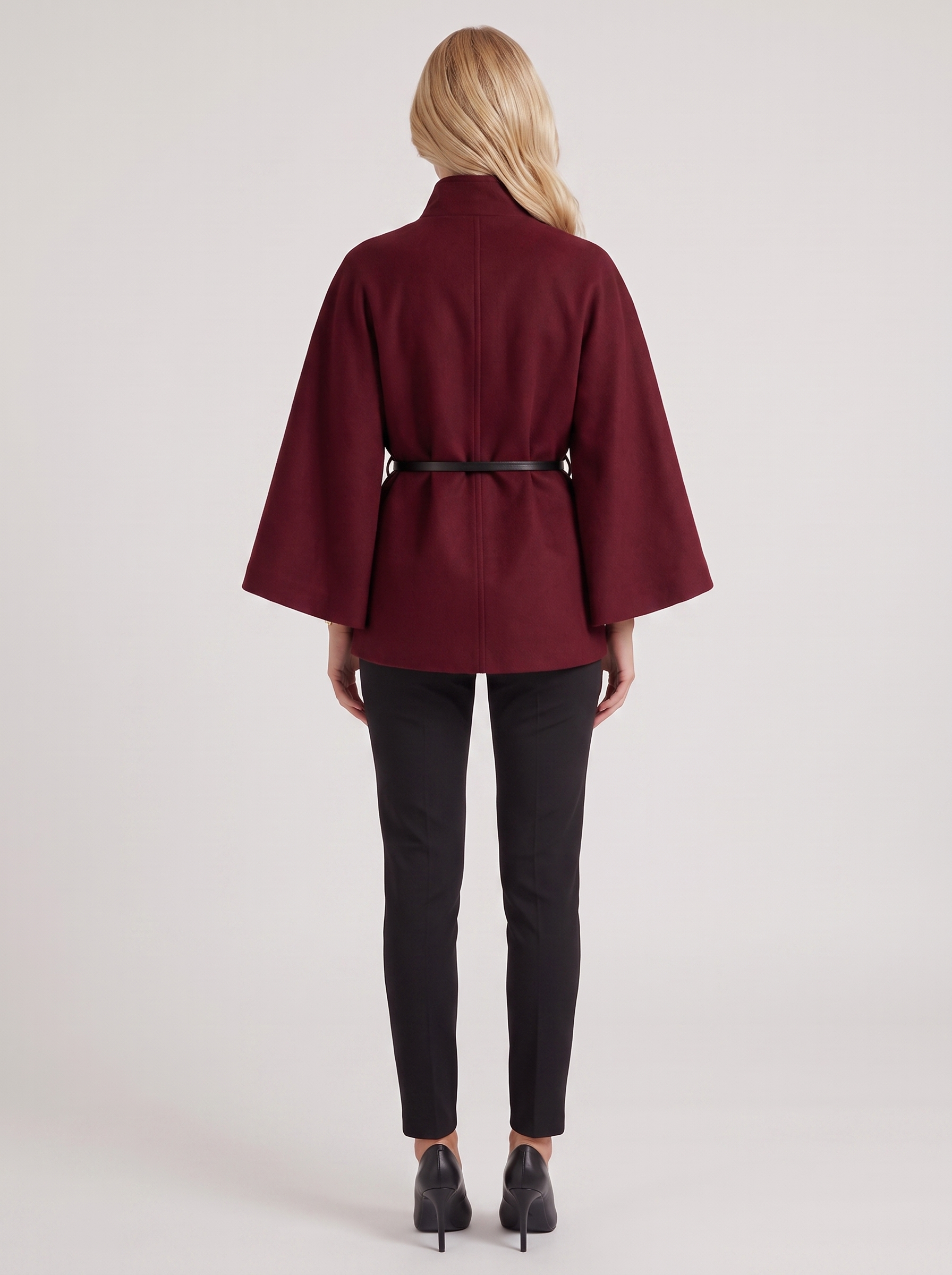 Women burgundy wool blend cape jacket with funnel neck, button fastening and slim belt, back view