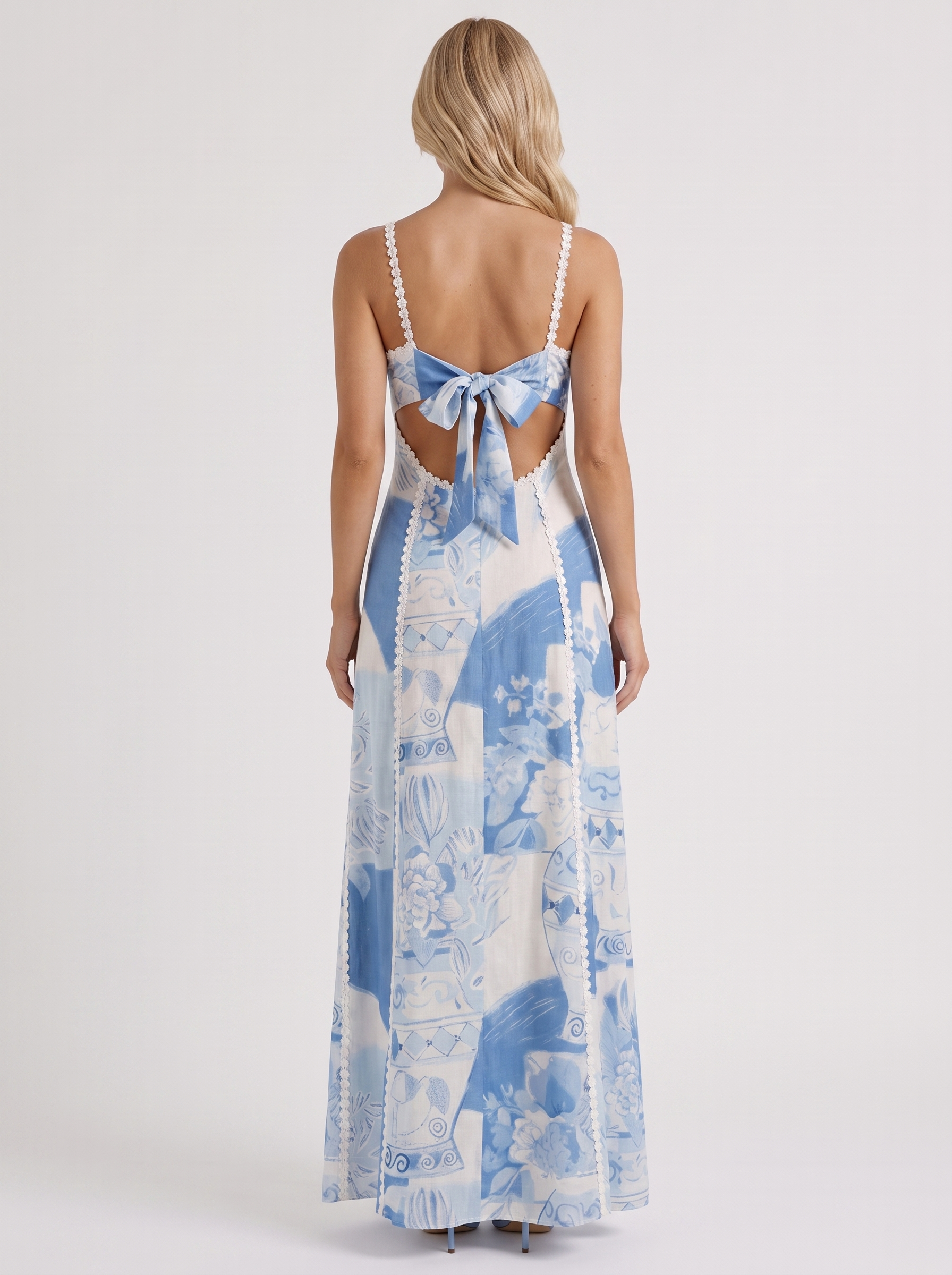 Women blue printed maxi dress with daisy braid trim and tie back bow