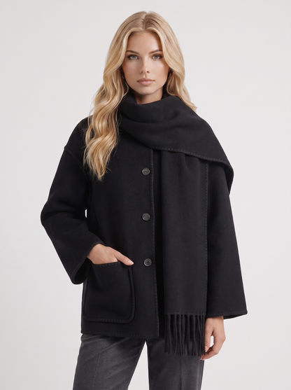 Women black wool blend coat with attached fringed scarf and blanket stitch edges, front detail