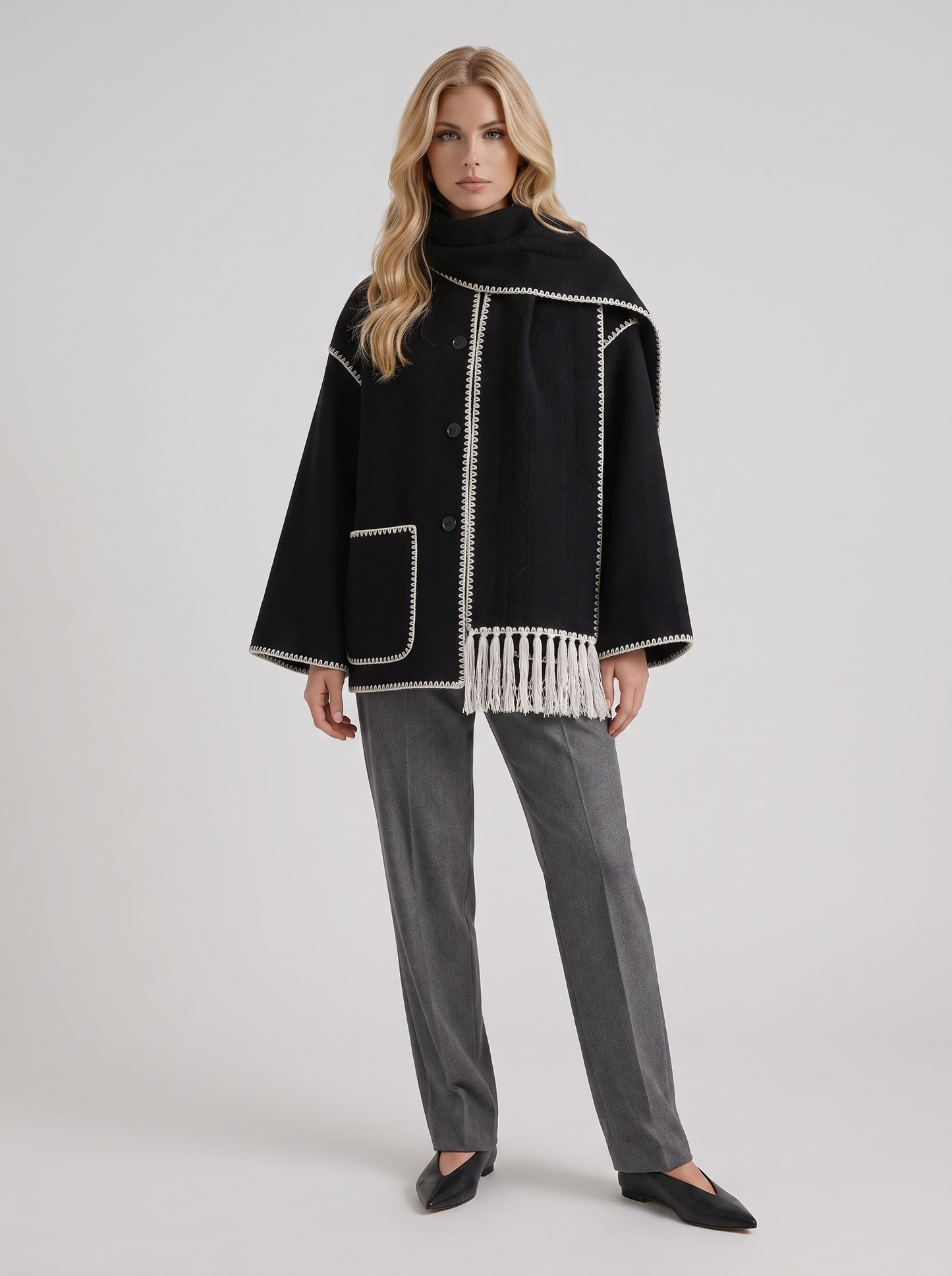 Women dark gray wool blend coat with attached fringed scarf and blanket stitch edges, front view