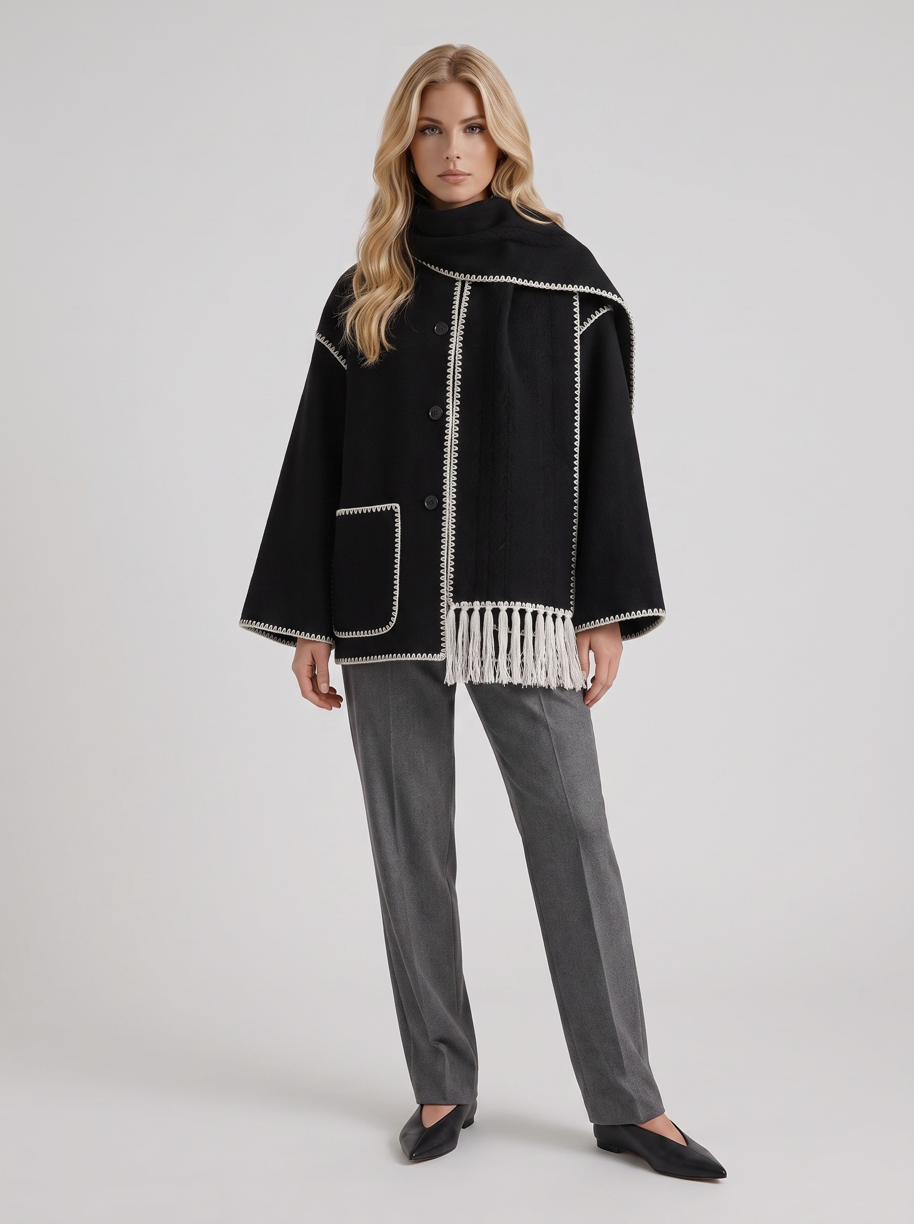 Women dark gray wool blend coat with attached fringed scarf and blanket stitch edges, front view