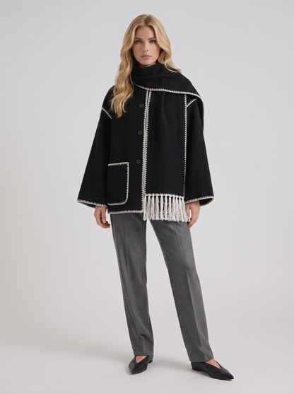 Women dark gray wool blend coat with attached fringed scarf and blanket stitch edges, front view