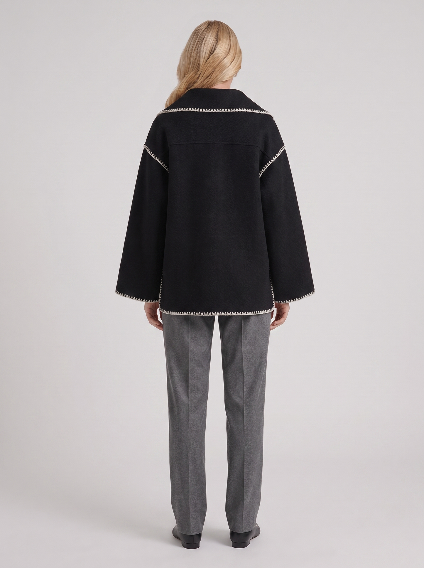 Women dark gray wool blend coat with attached fringed scarf and blanket stitch edges, back view