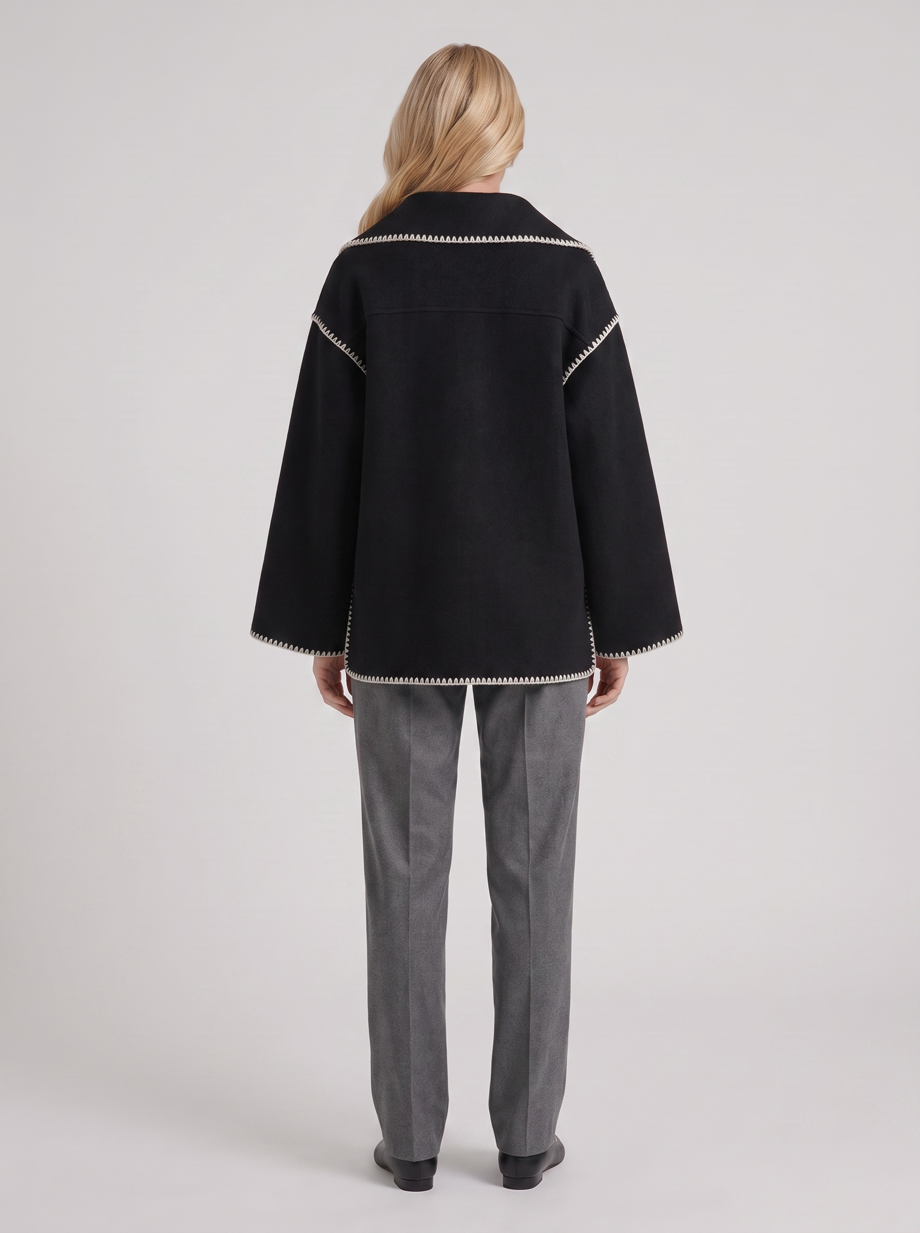 Women dark gray wool blend coat with attached fringed scarf and blanket stitch edges, back view