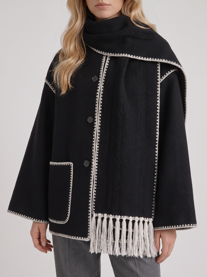 Women dark gray wool blend coat with attached fringed scarf and blanket stitch edges, fabric closeup