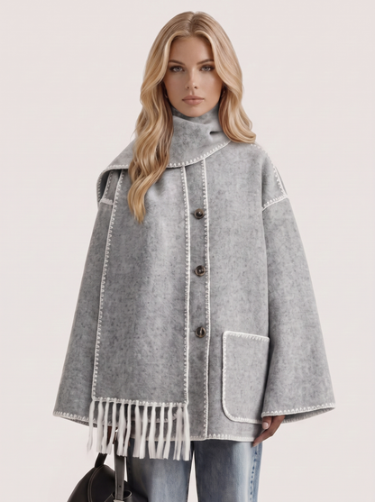 Women light gray wool blend coat with attached fringed scarf and blanket stitch edges, front detail