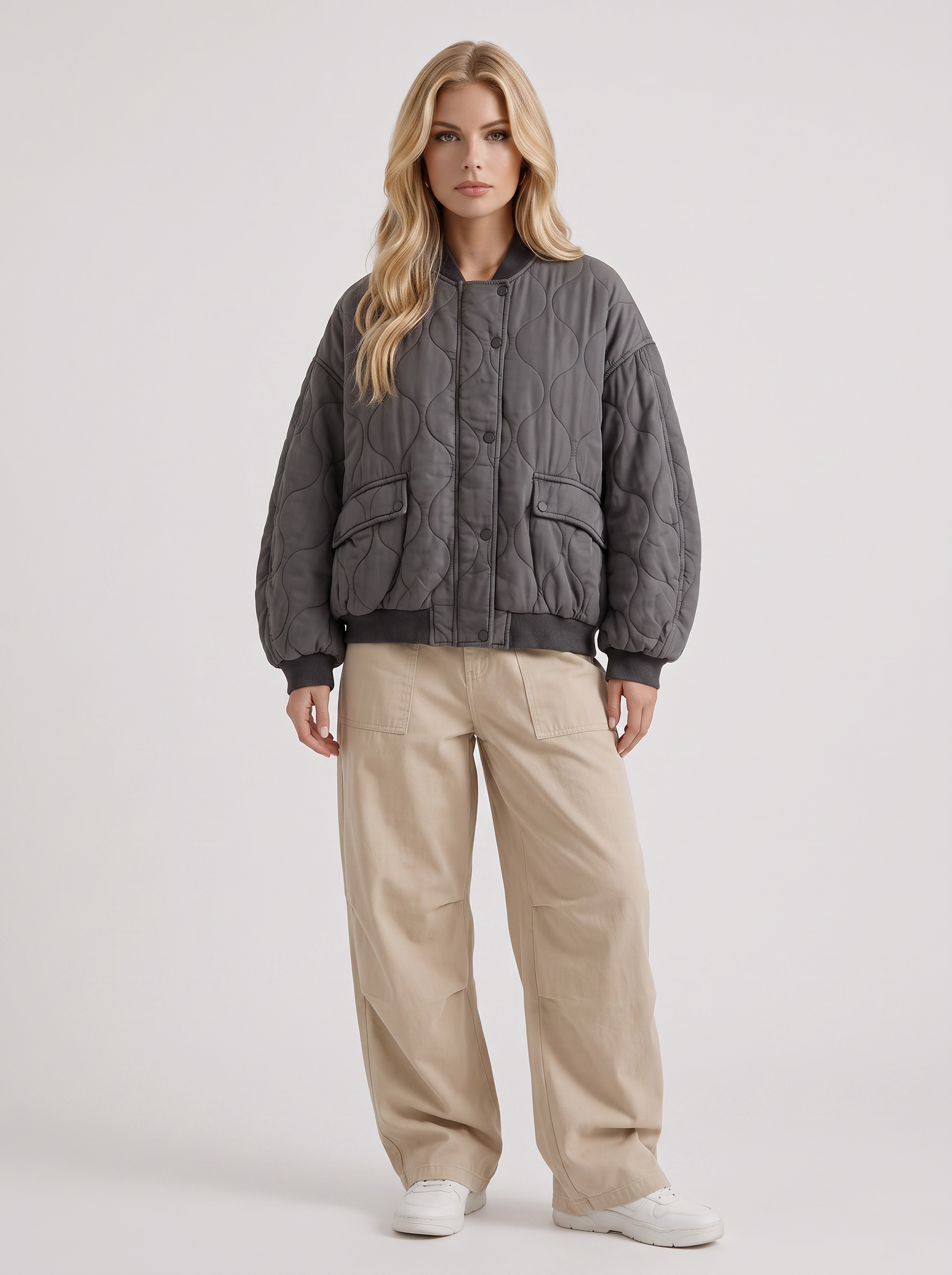 Women charcoal oversized onion quilted bomber jacket with snap front and ribbed trims, front view
