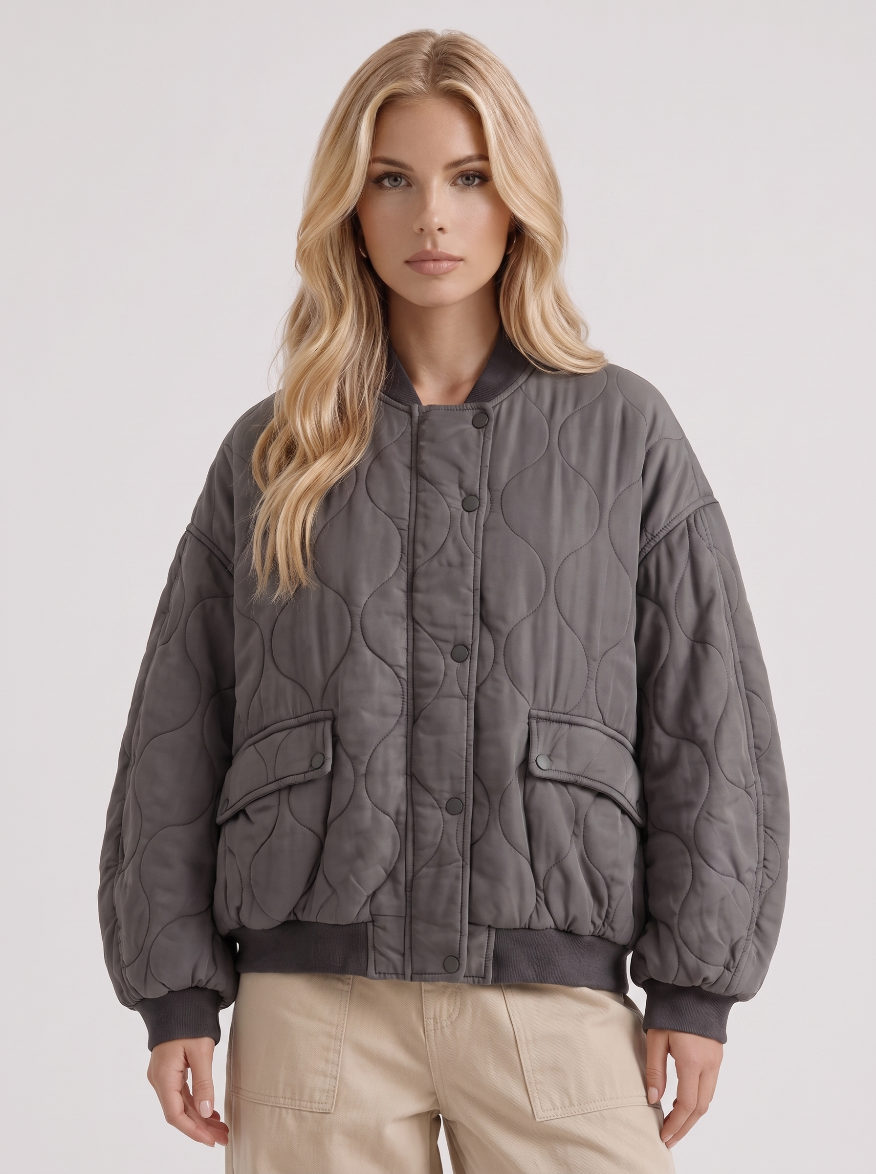 Women charcoal oversized onion quilted bomber jacket with snap front and ribbed trims, front detail