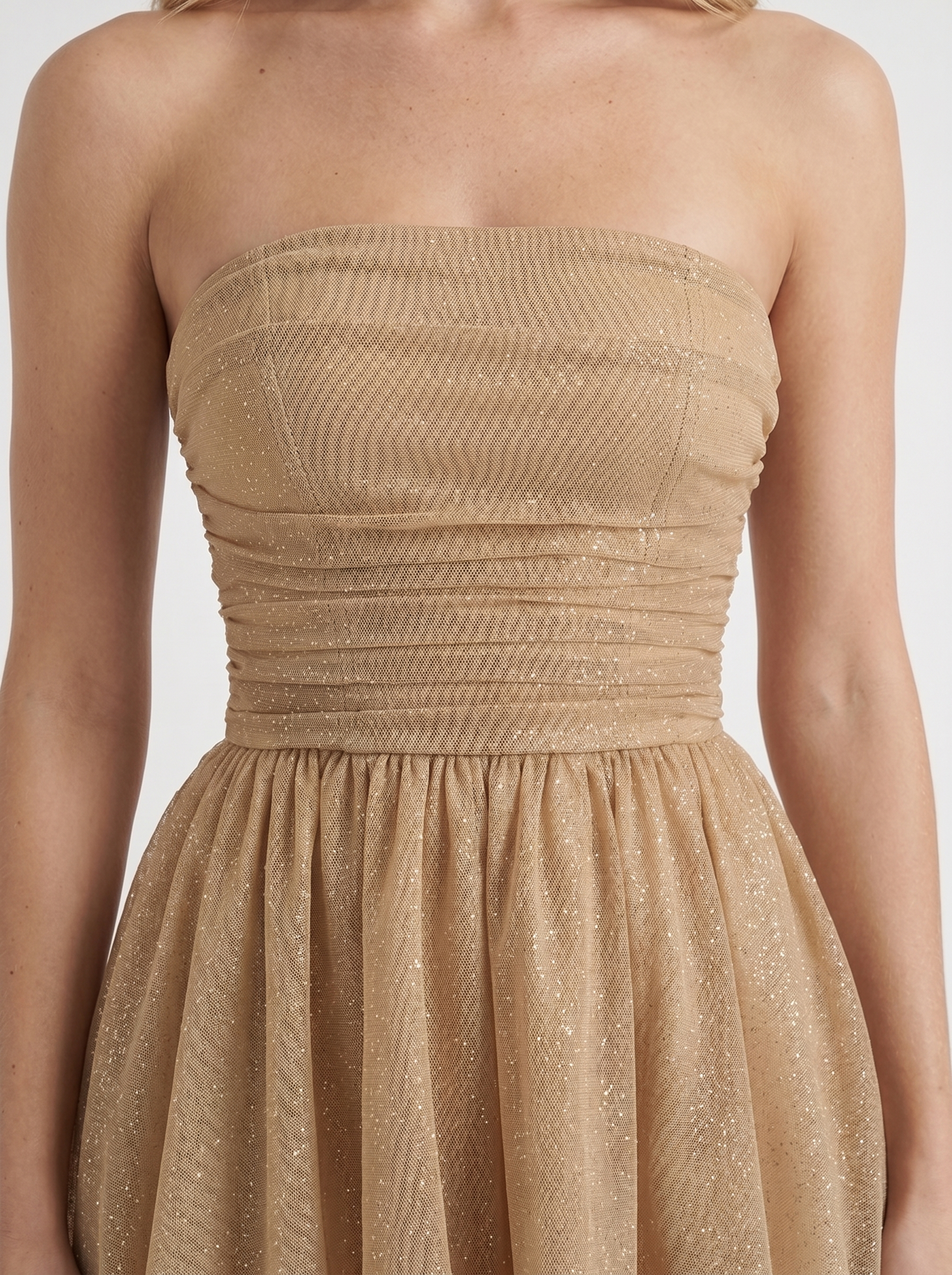 Women gold sequin sparkle mini dress closeup of ruched bodice and sequin shimmer