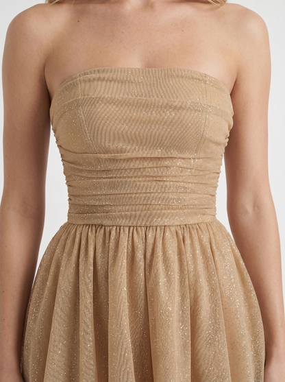 Women gold sequin sparkle mini dress closeup of ruched bodice and sequin shimmer