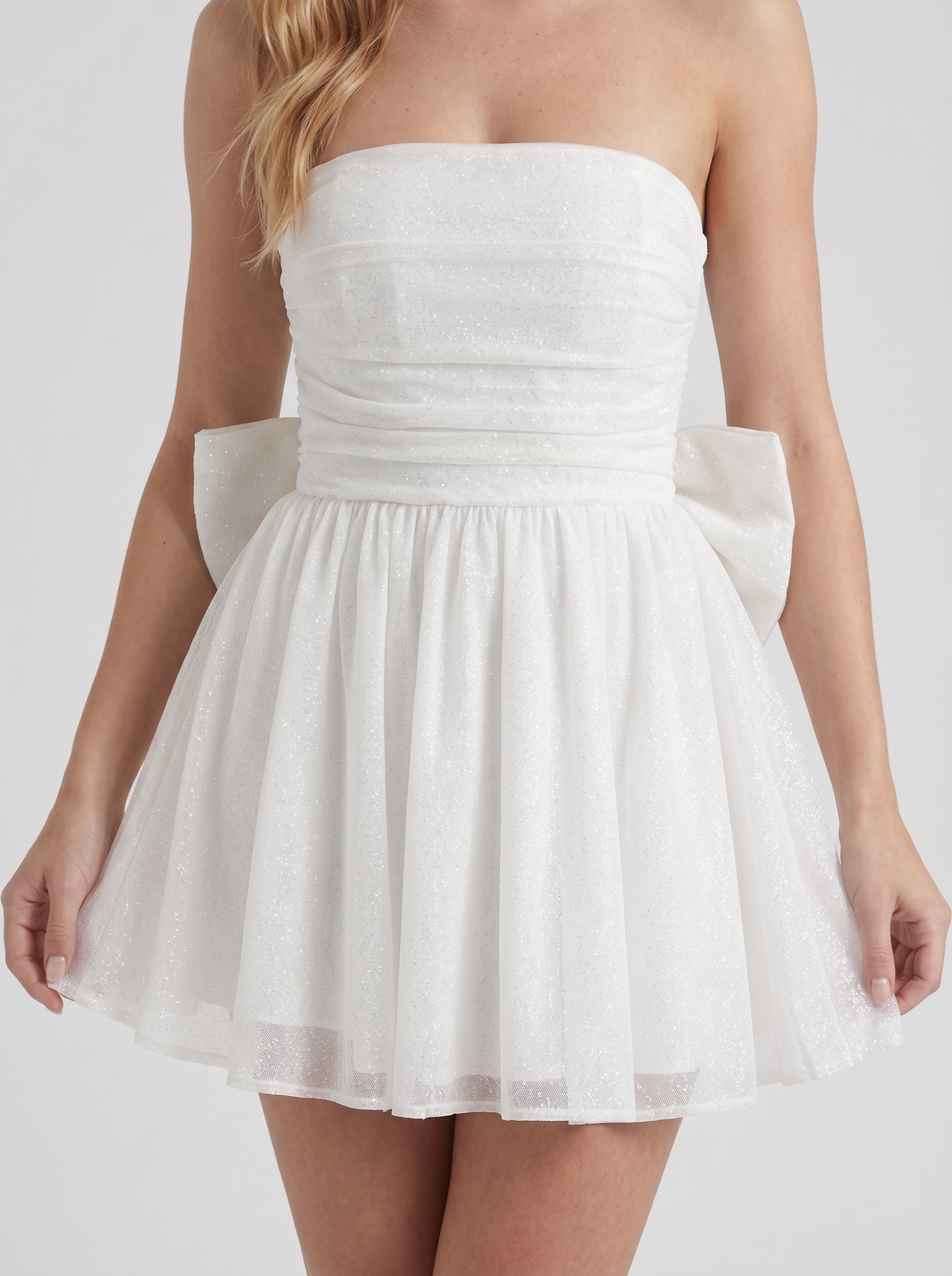 Women ivory sequin sparkle mini dress closeup of ruched bodice and sequin shimmer