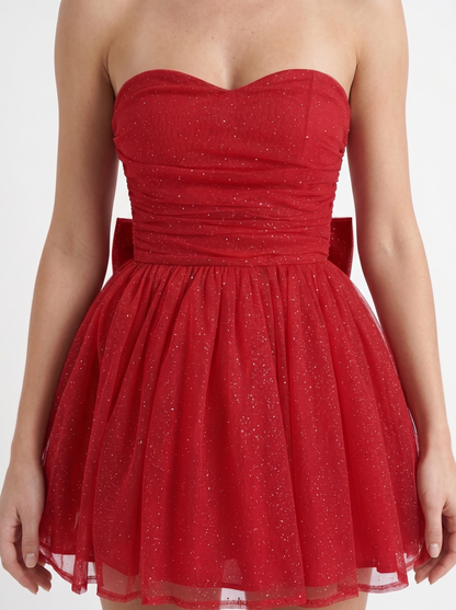 Women red sequin sparkle mini dress closeup of ruched bodice and sequin shimmer
