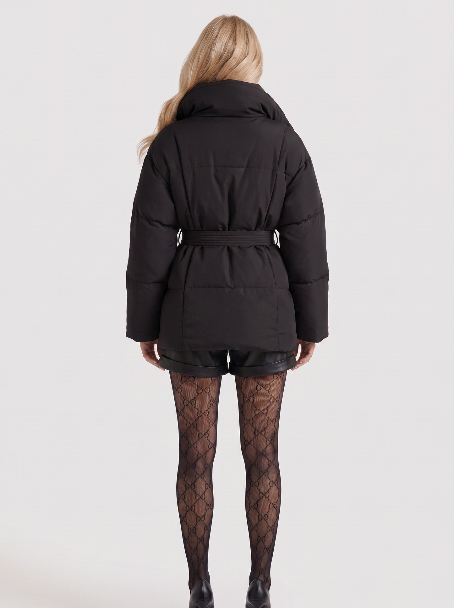 Women black oversized padded jacket with wide portrait collar and tie waist belt, back view
