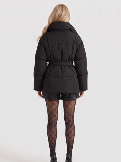 Women black oversized padded jacket with wide portrait collar and tie waist belt, back view