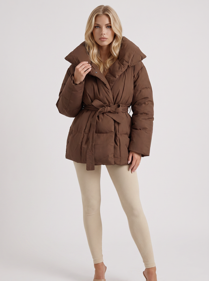 Women brown oversized padded jacket with wide portrait collar and tie waist belt, front view