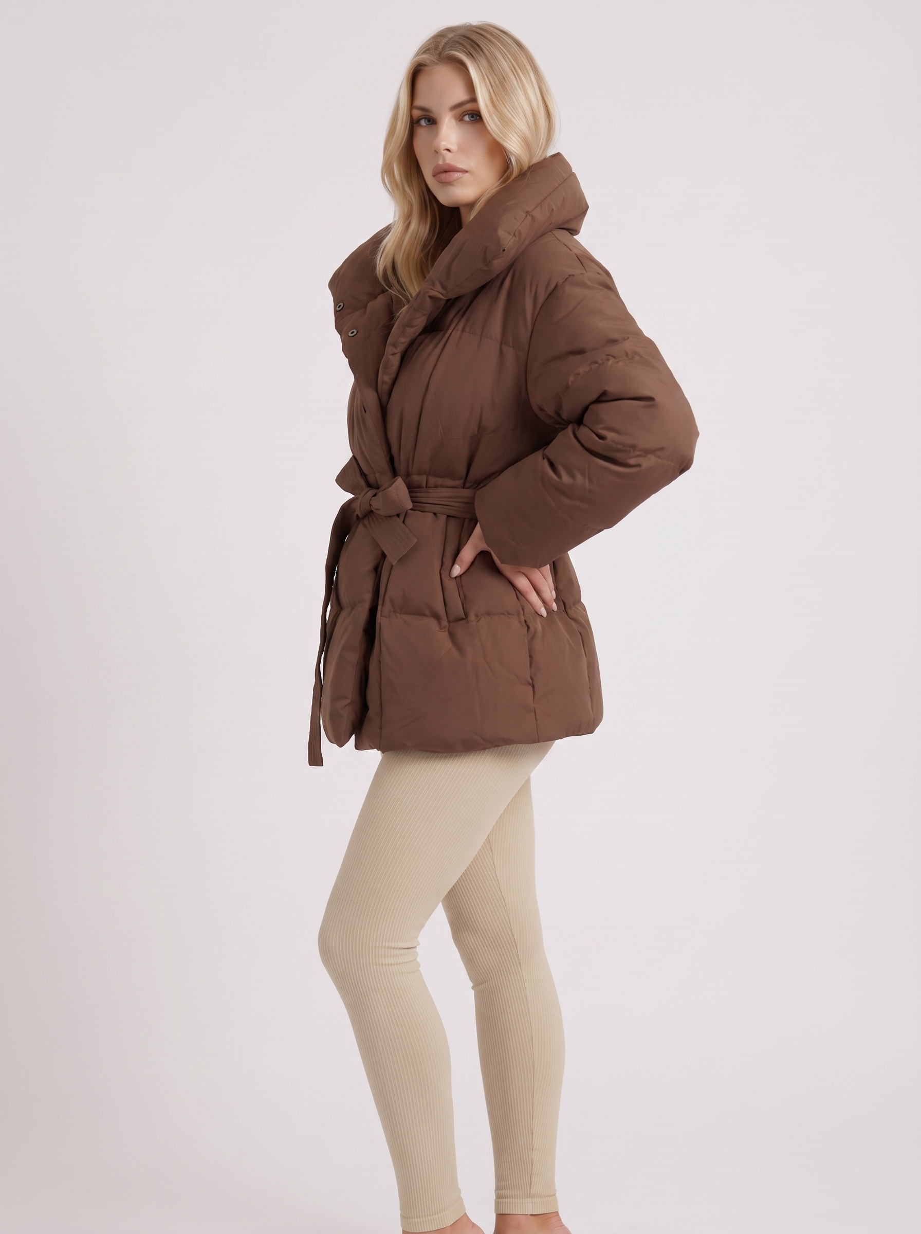Women brown oversized padded jacket with wide portrait collar and tie waist belt, three quarter view